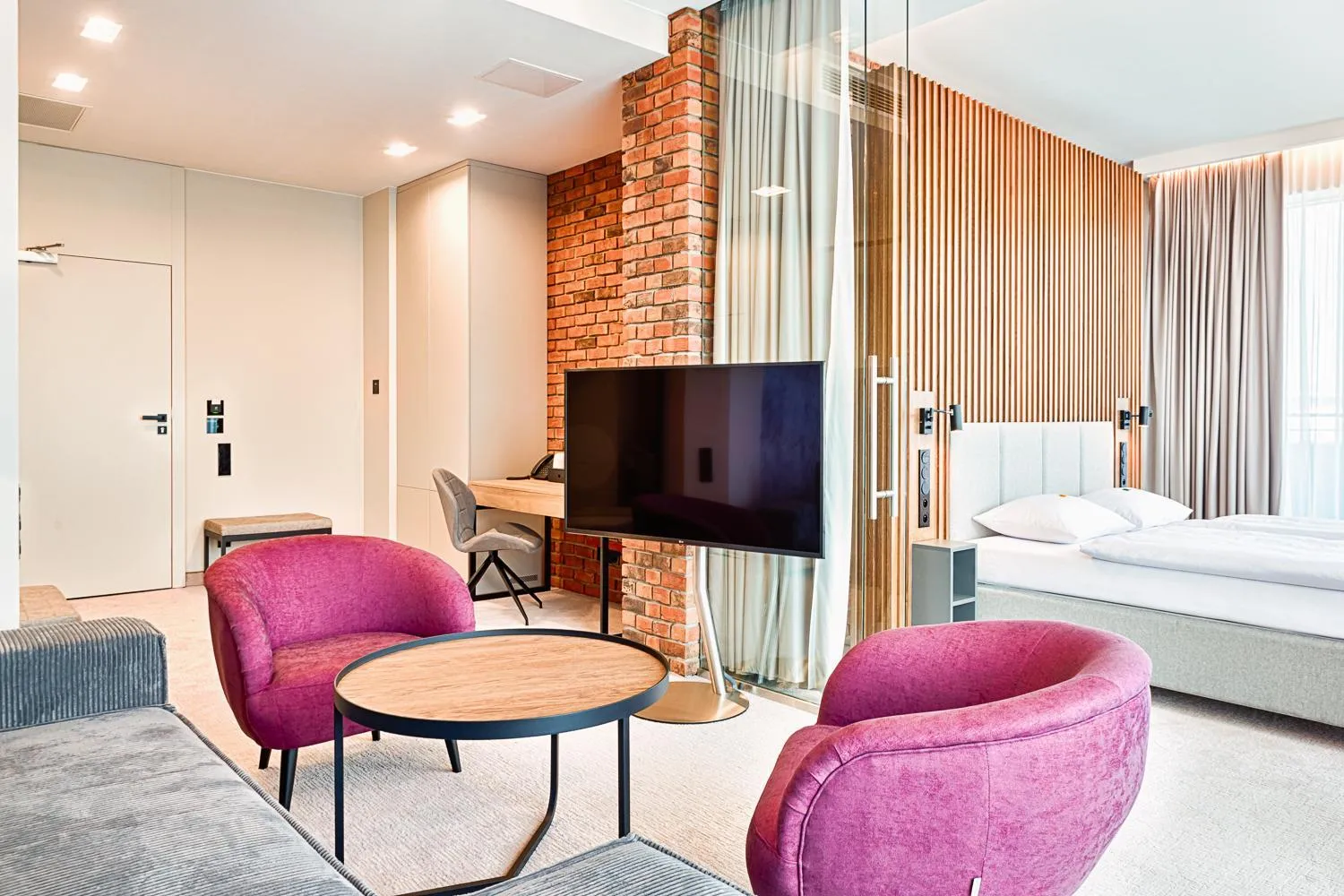 Seating area, Bed in Hotel The Loom