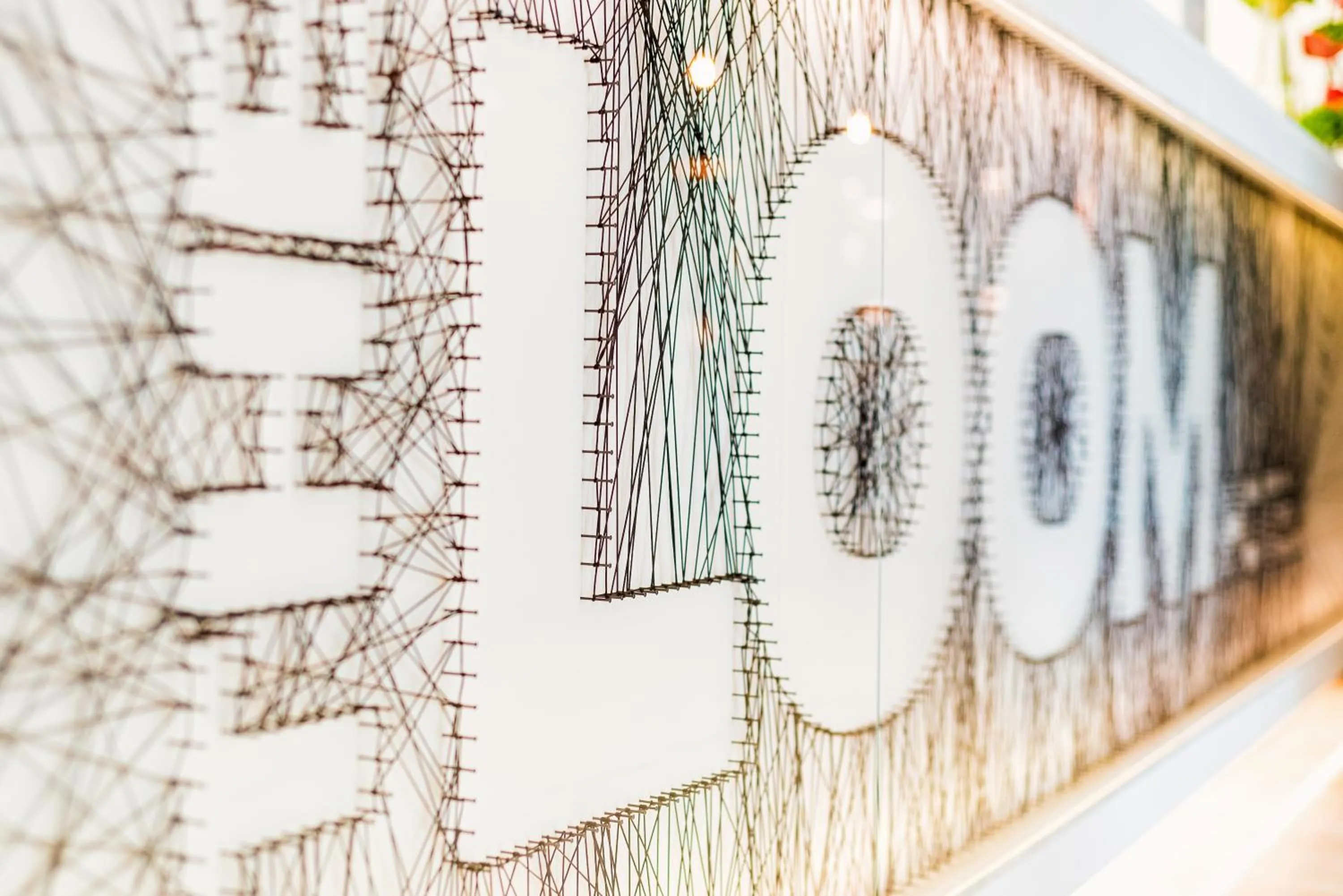 Property logo or sign in Hotel The Loom