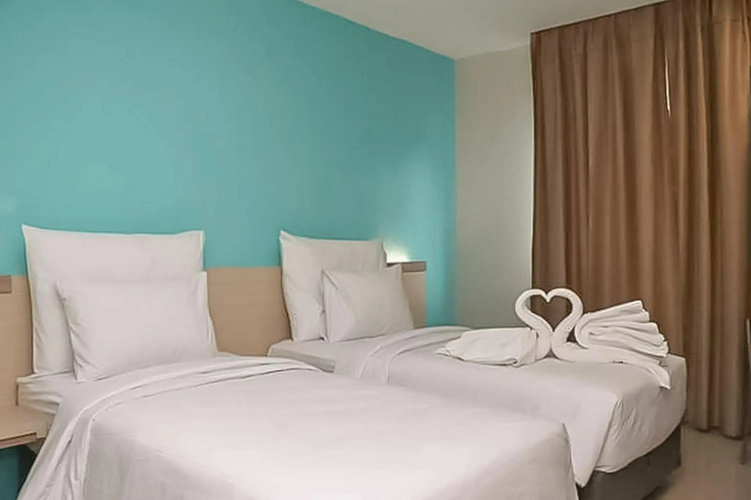 Bed in Hotel Mutiara Padang Sidimpuan Mitra RedDoorz Bed in Hotel Mutiara Padang Sidimpuan Mitra RedDoorz