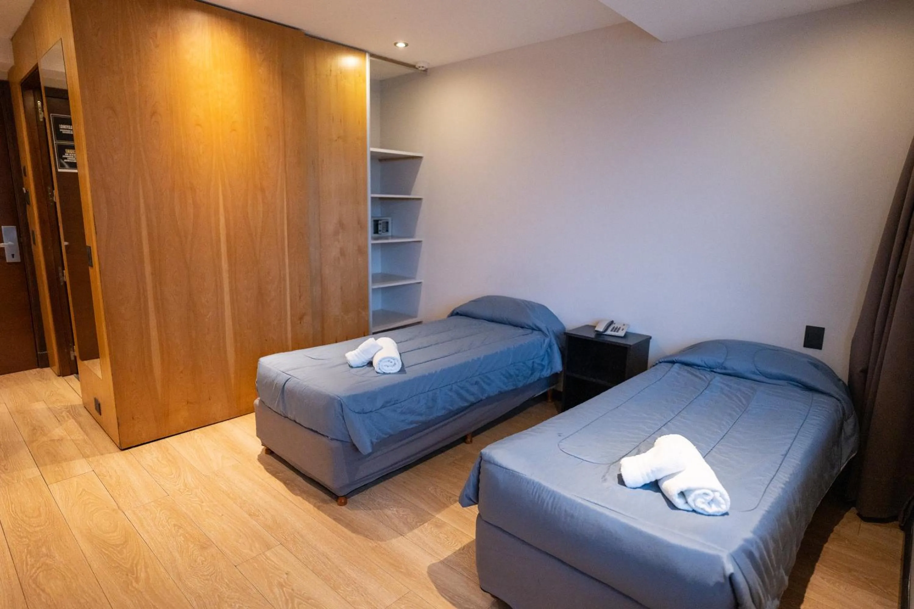 Bed in Hotel Bariloche Suites