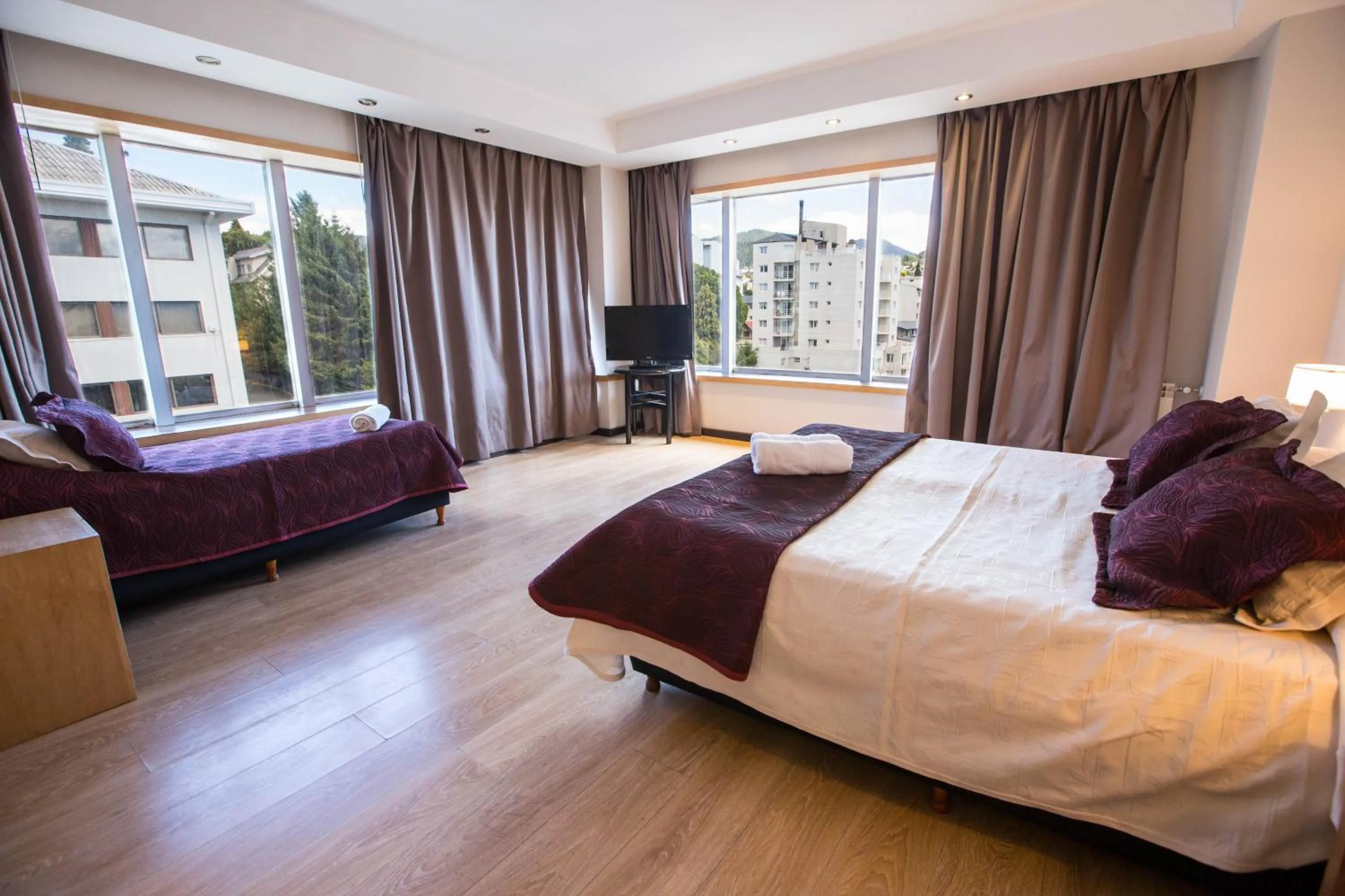 Photo of the whole room, Bed in Hotel Bariloche Suites