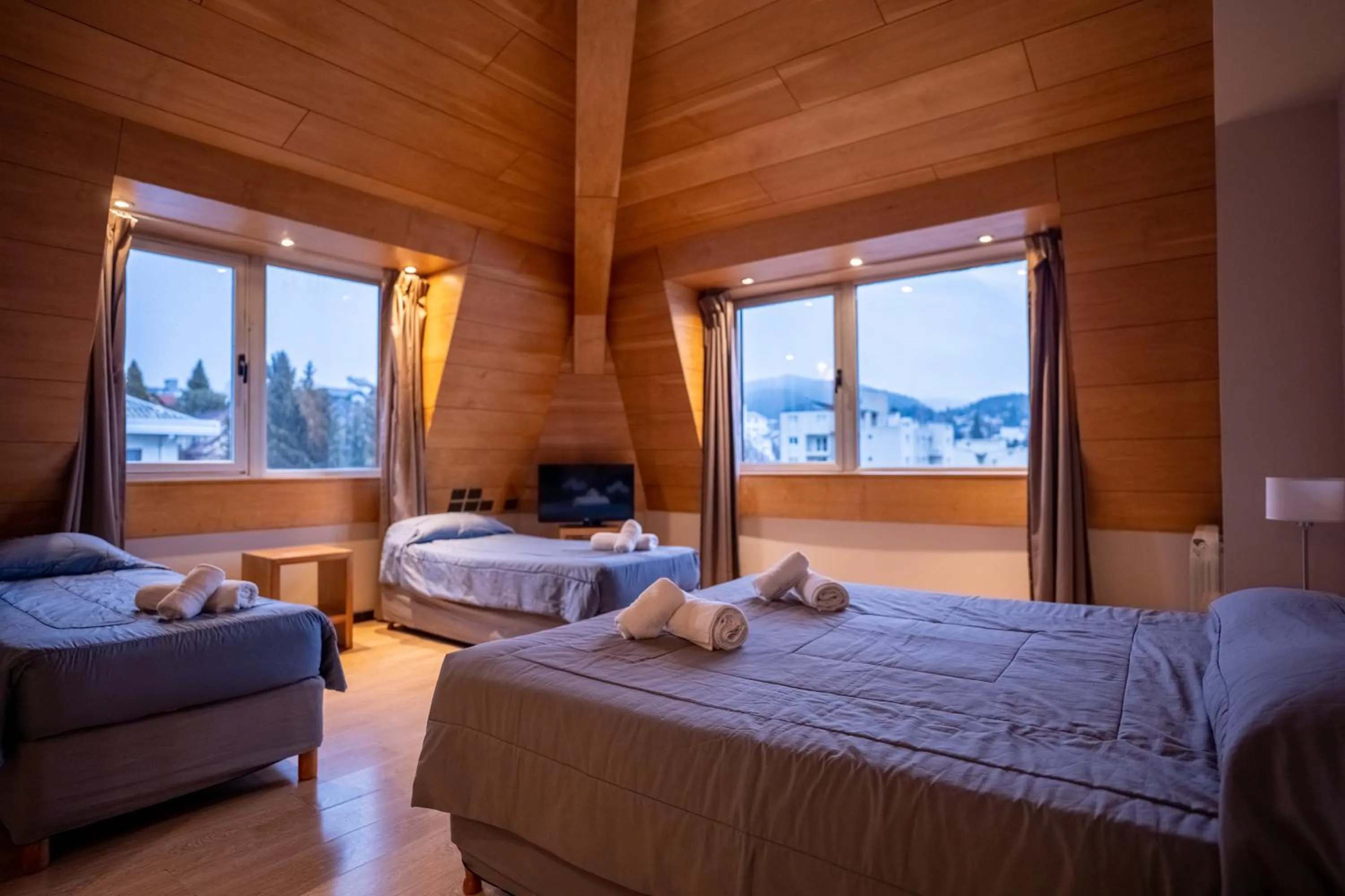 Bed in Hotel Bariloche Suites