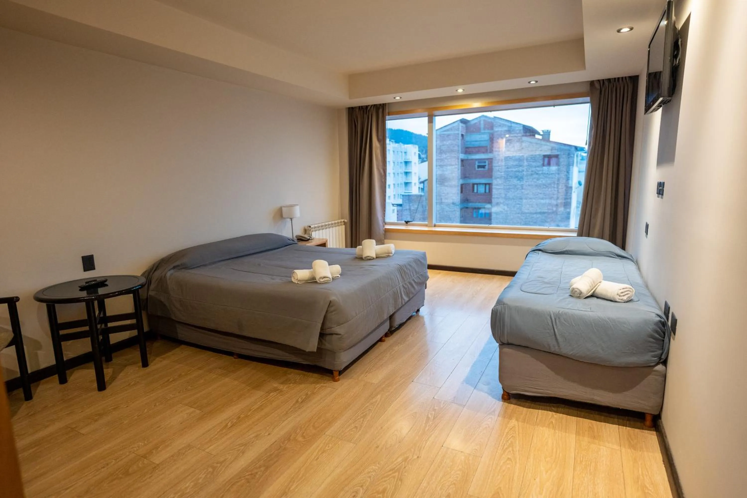 Bed in Hotel Bariloche Suites