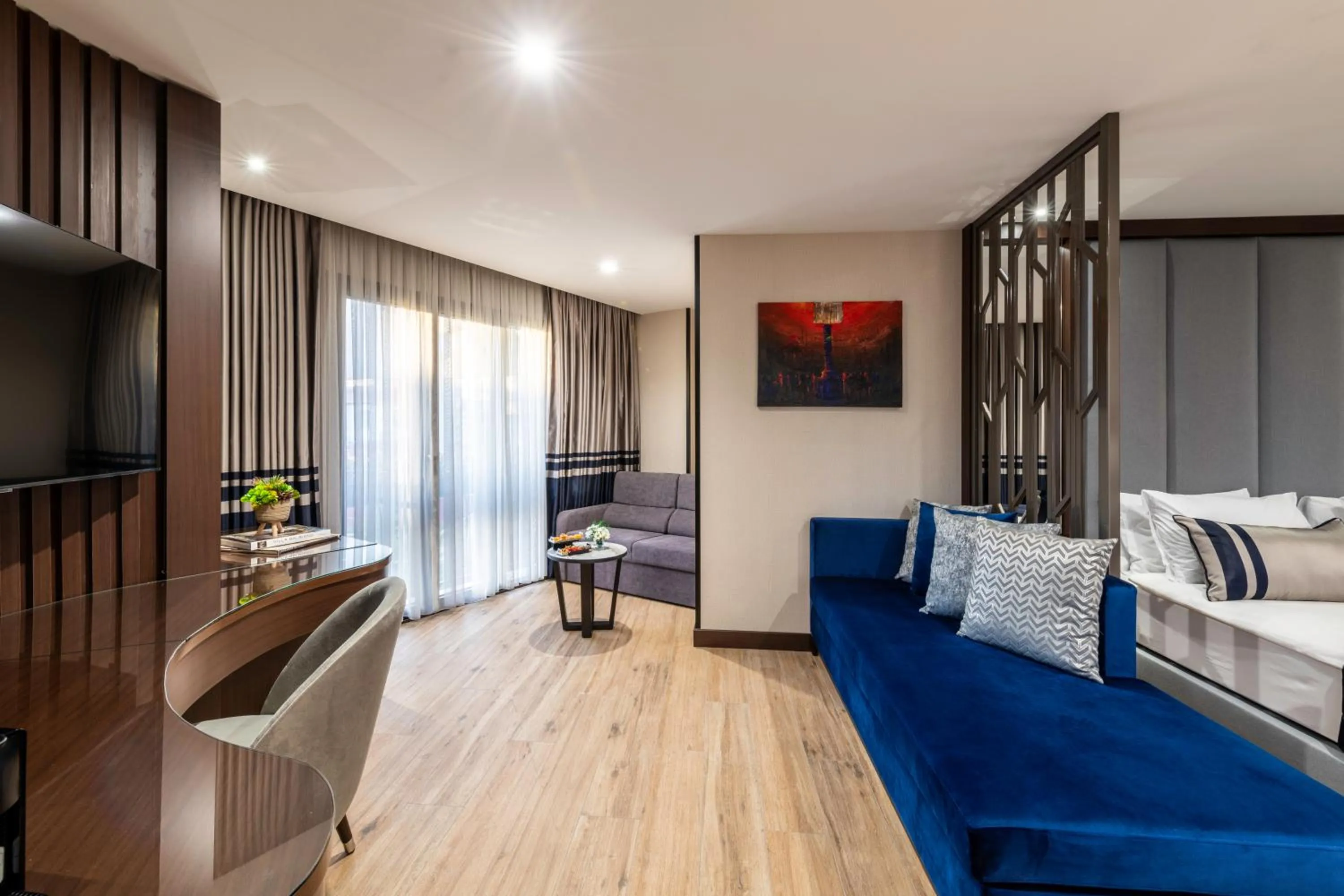 Seating area, Bed in Aprilis Deluxe Hotel