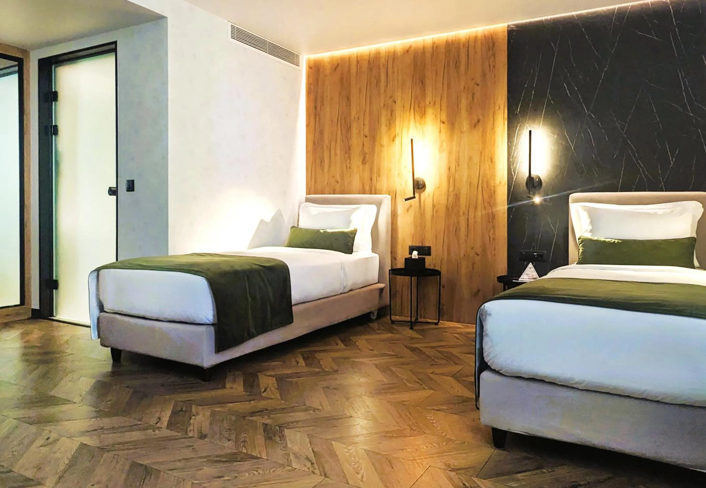 Bed in The Port Square Hotel