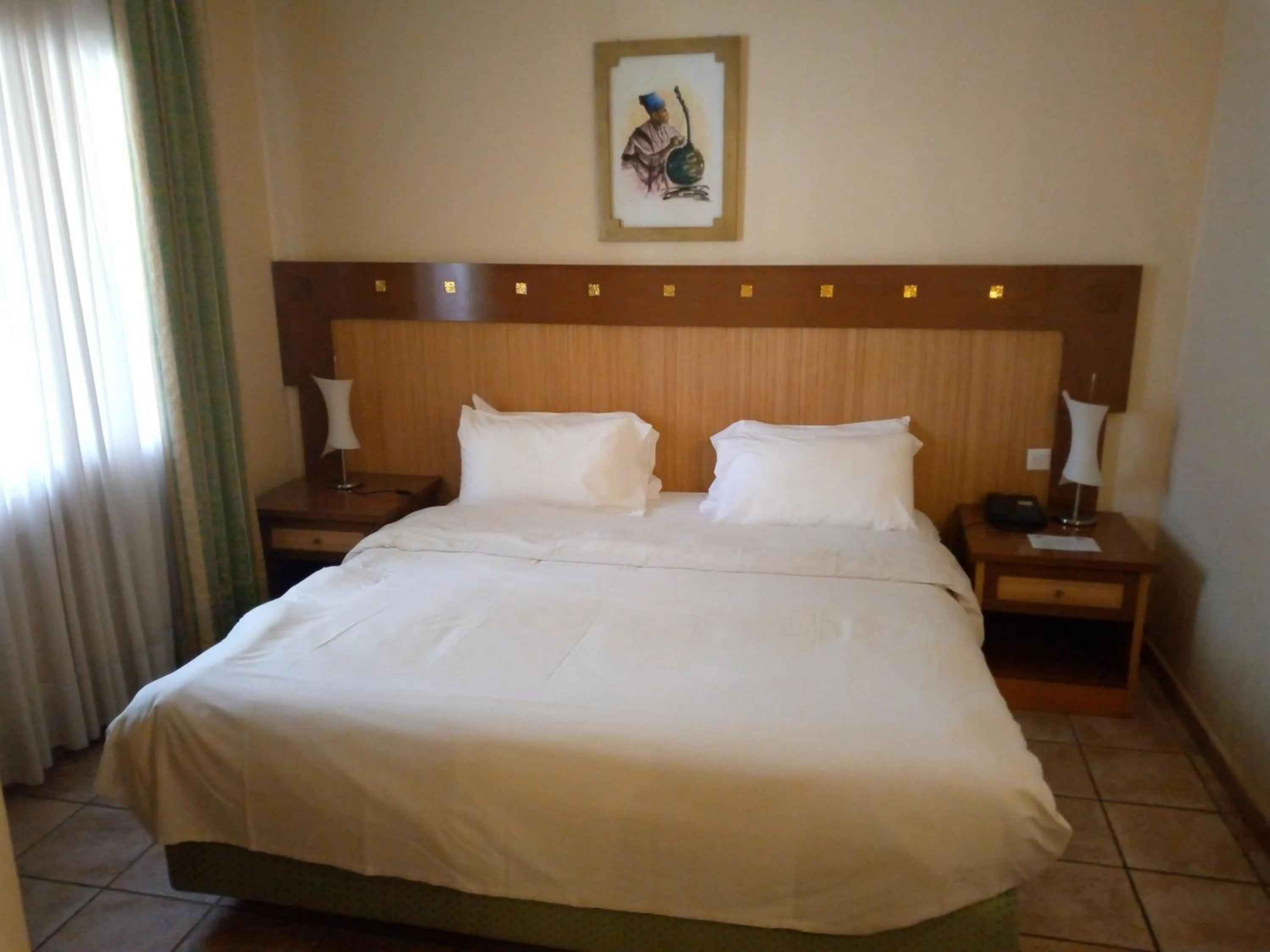 Bed in The Kairaba Beach Hotel