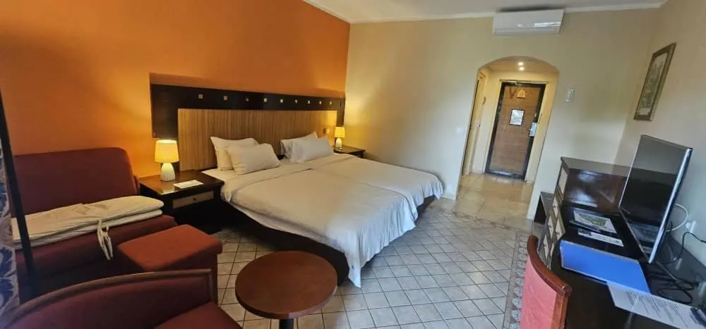 Bed in The Kairaba Beach Hotel