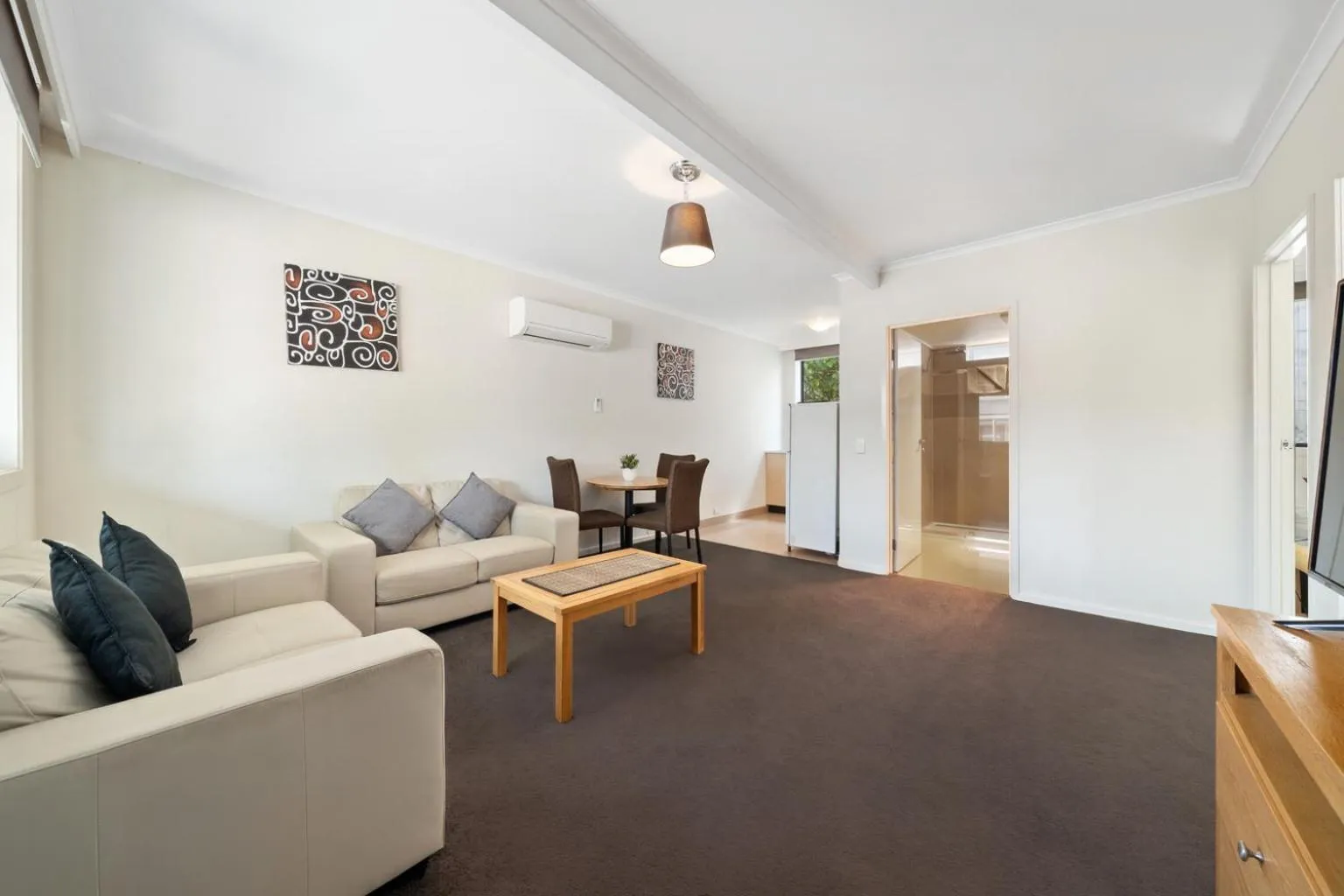 Living room in New Crossing Place Motel