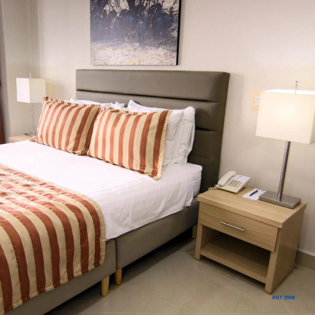 Property building, Bed in Hotel Neiva Plaza