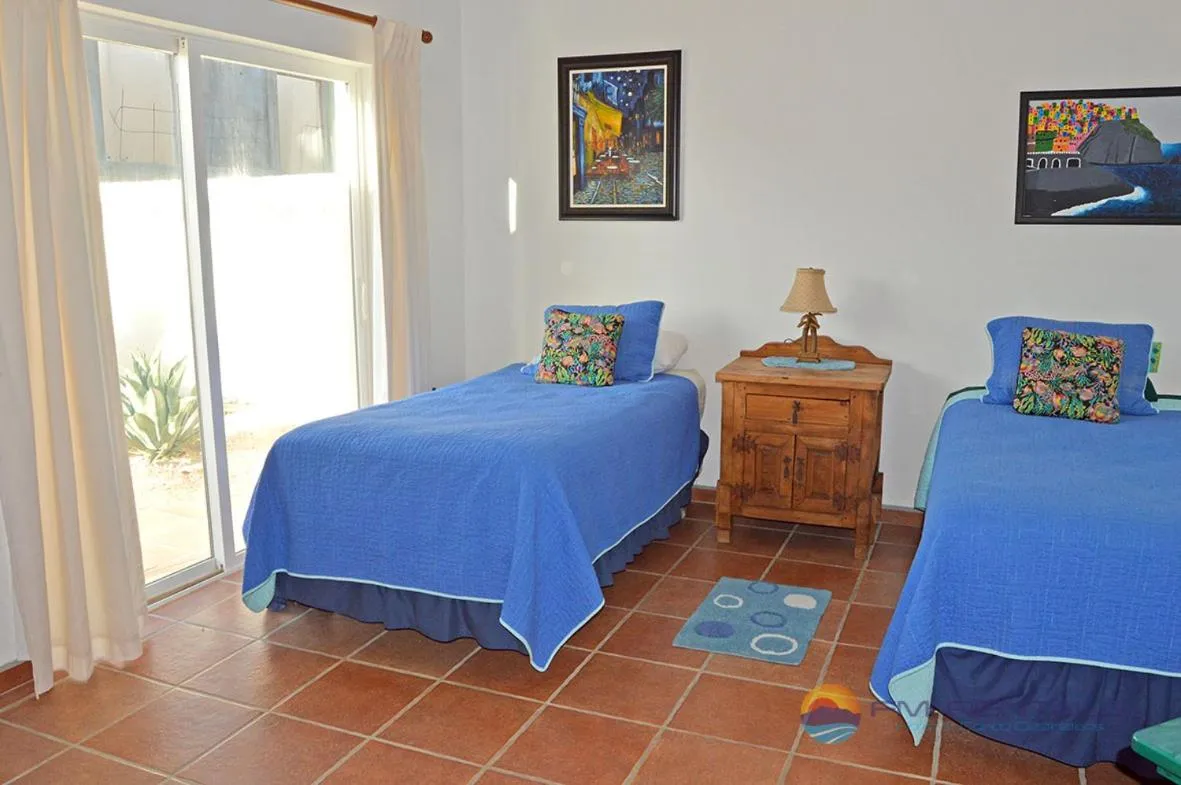 Bed in Casa Mariposa Azul by FMI Rentals