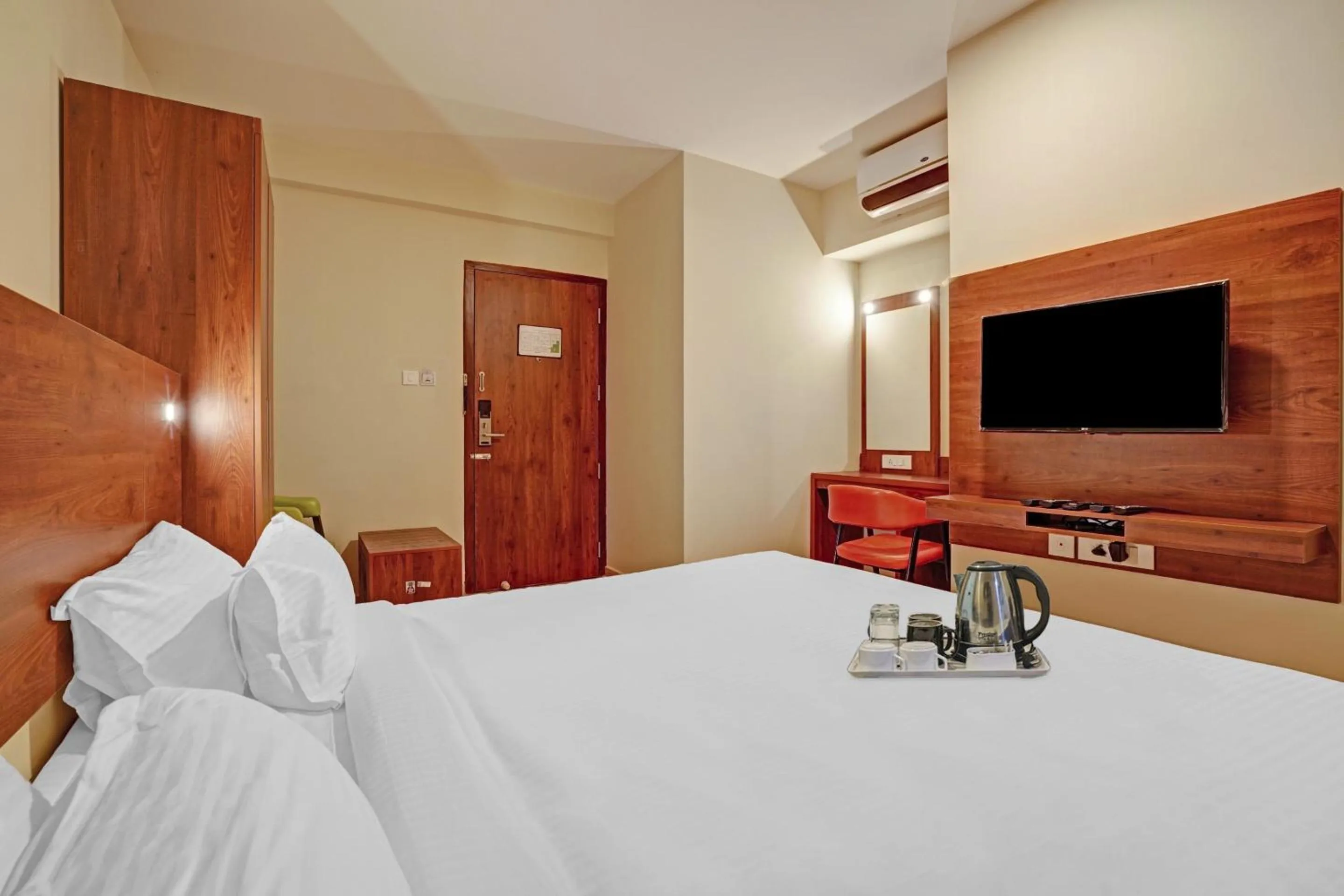 Lobby or reception, Bed in Super Townhouse Edasserys Sea Pearl