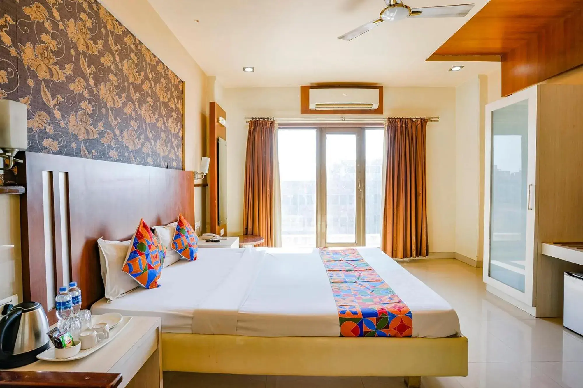 Bed in FabHotel Devanshi Inn Bed in FabHotel Devanshi Inn