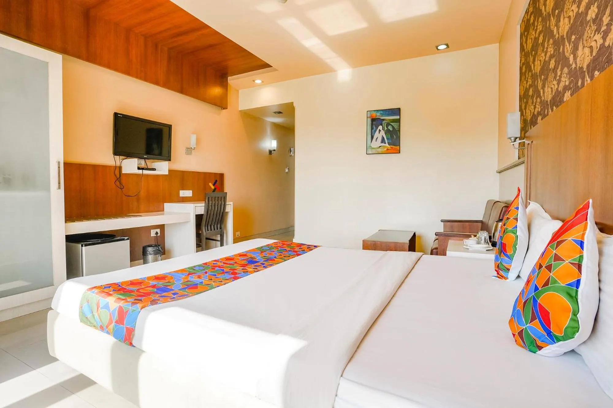 Bed in FabHotel Devanshi Inn