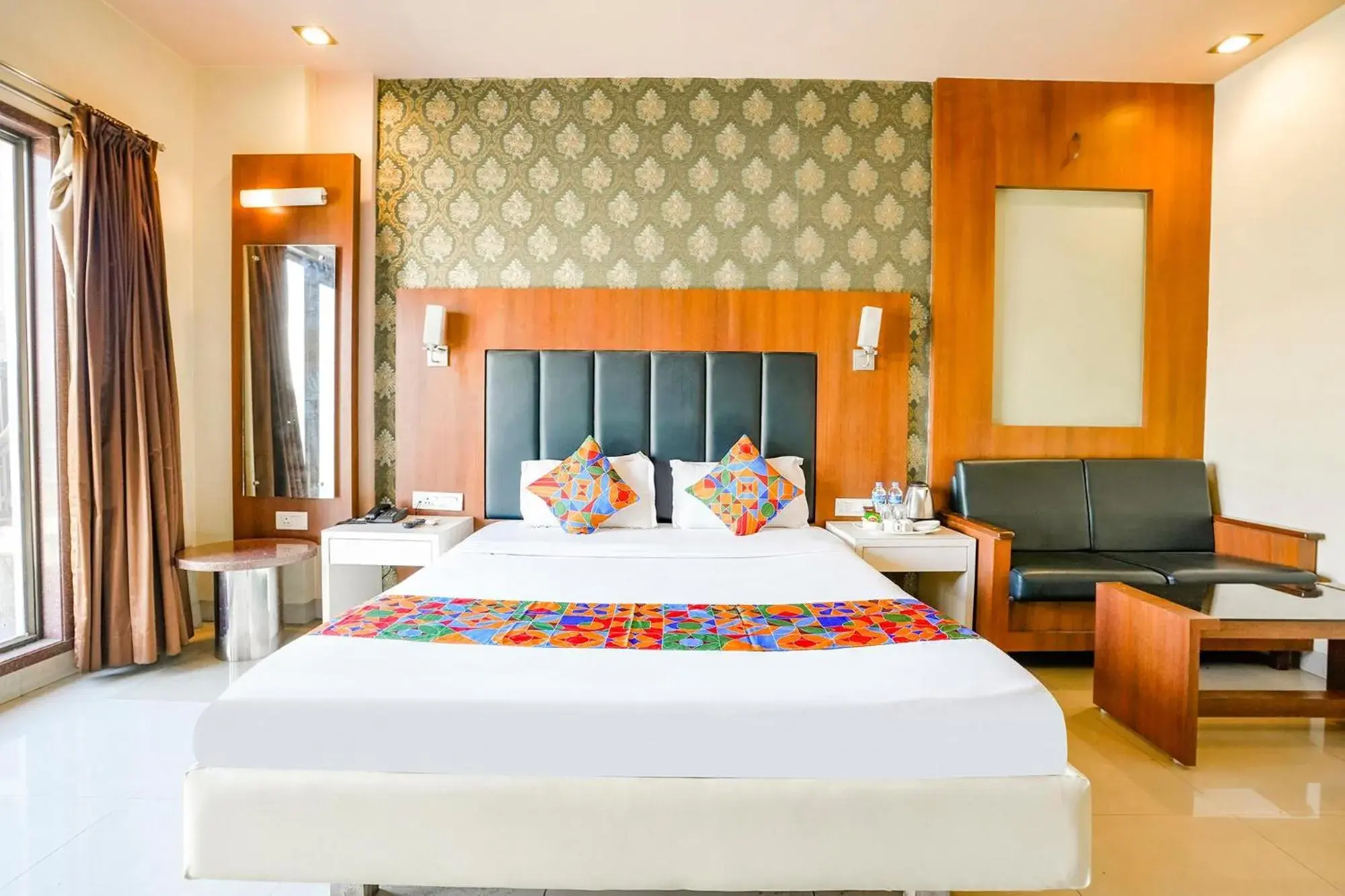 Bed in FabHotel Devanshi Inn Bed in FabHotel Devanshi Inn