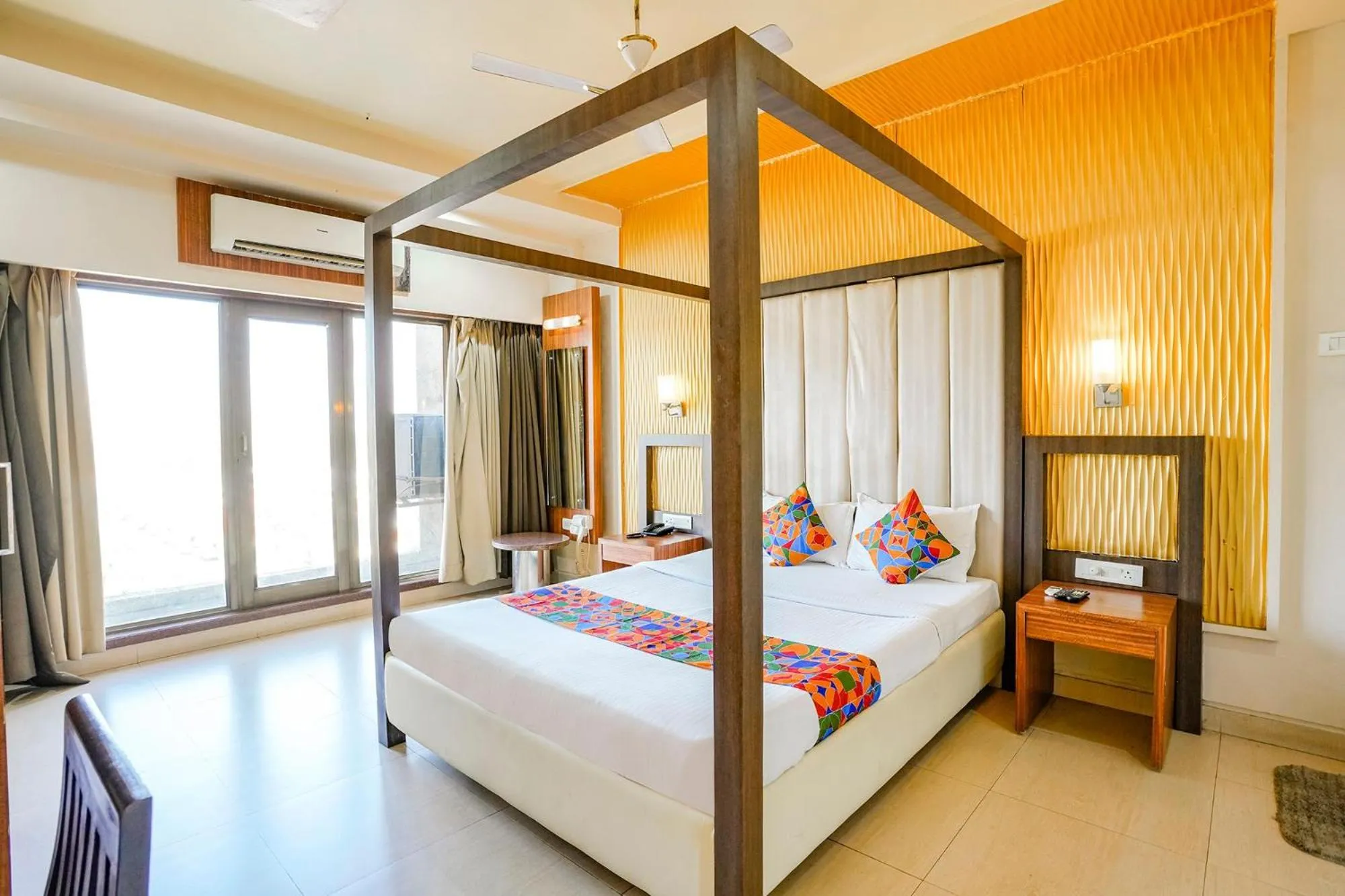 Bed in FabHotel Devanshi Inn