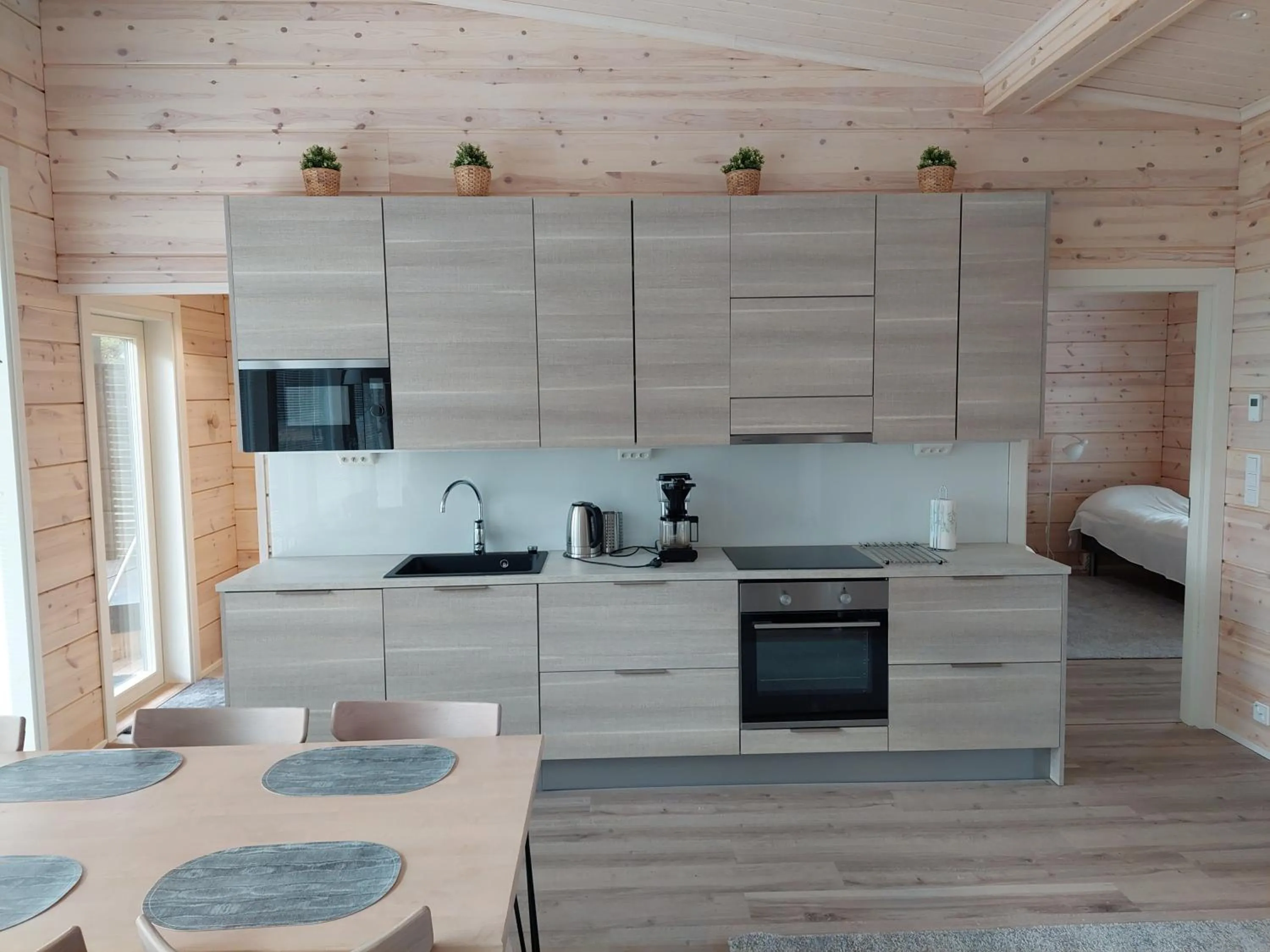 Kitchen or kitchenette in Villa Paatari, Inari (Paadarjärvi)