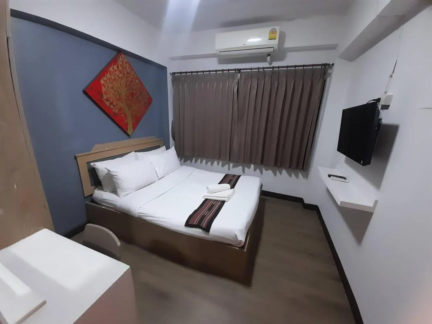 Bed in Home Place Hotel