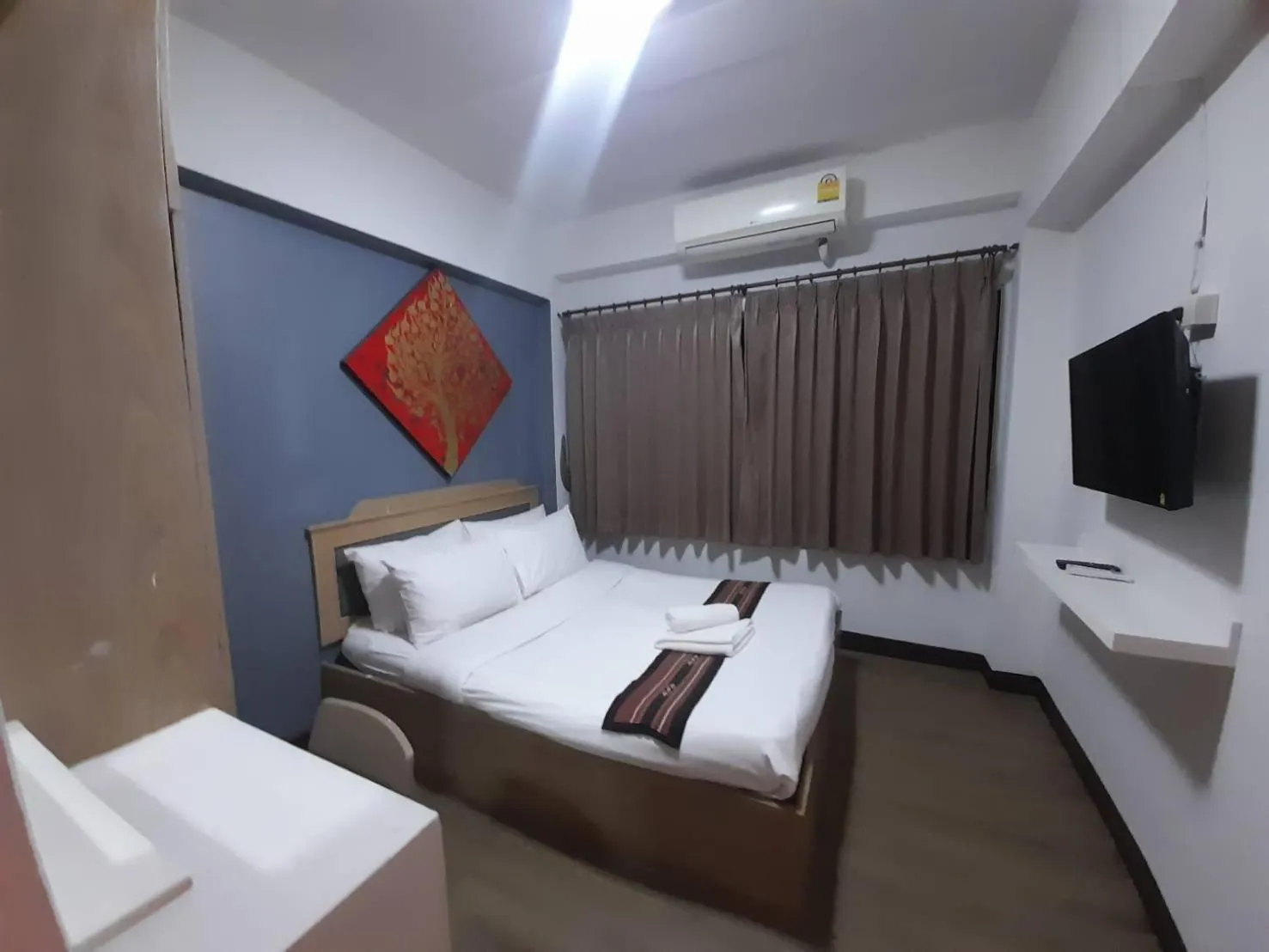 Bed in Home Place Hotel