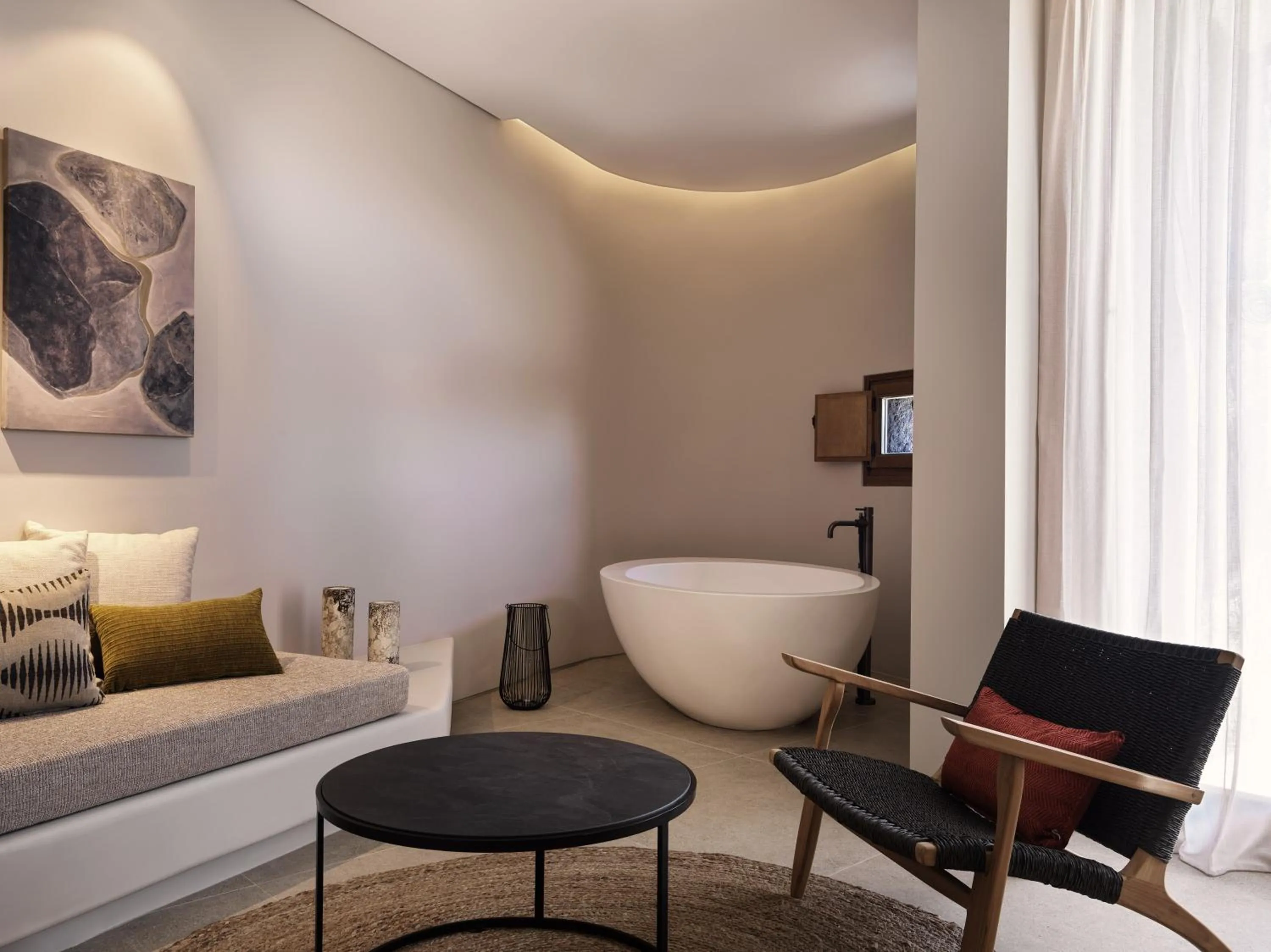 Living room in Magma Resort Santorini, In The Unbound Collection By Hyatt