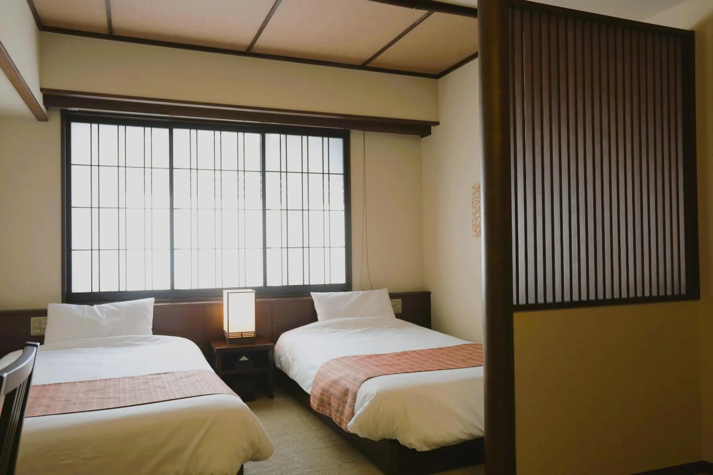Bed in Kadensho, Arashiyama Onsen, Kyoto - Kyoritsu Resort