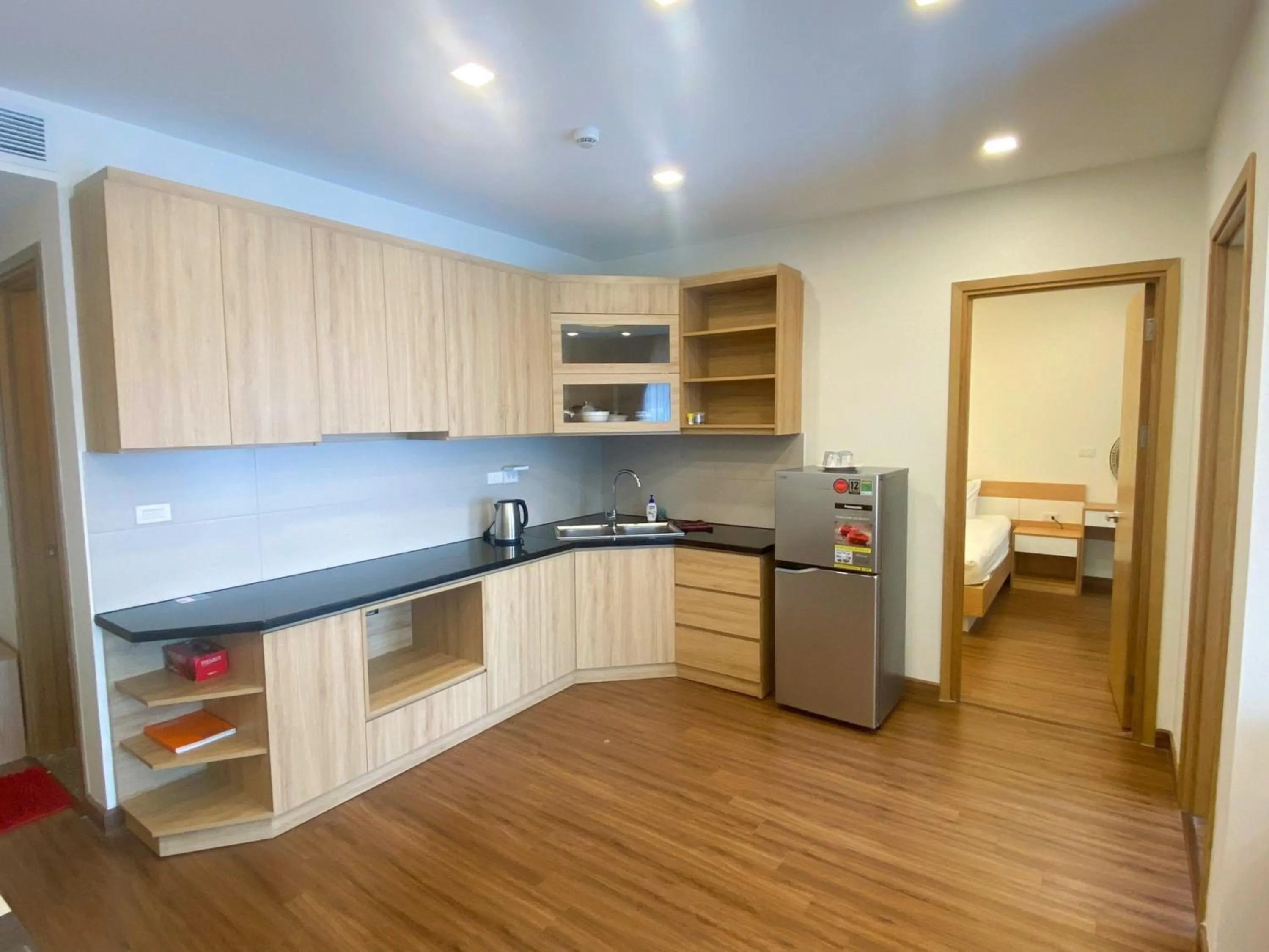 Kitchen or kitchenette in FLC Sea Tower Quy Nhon -Tran Apartment