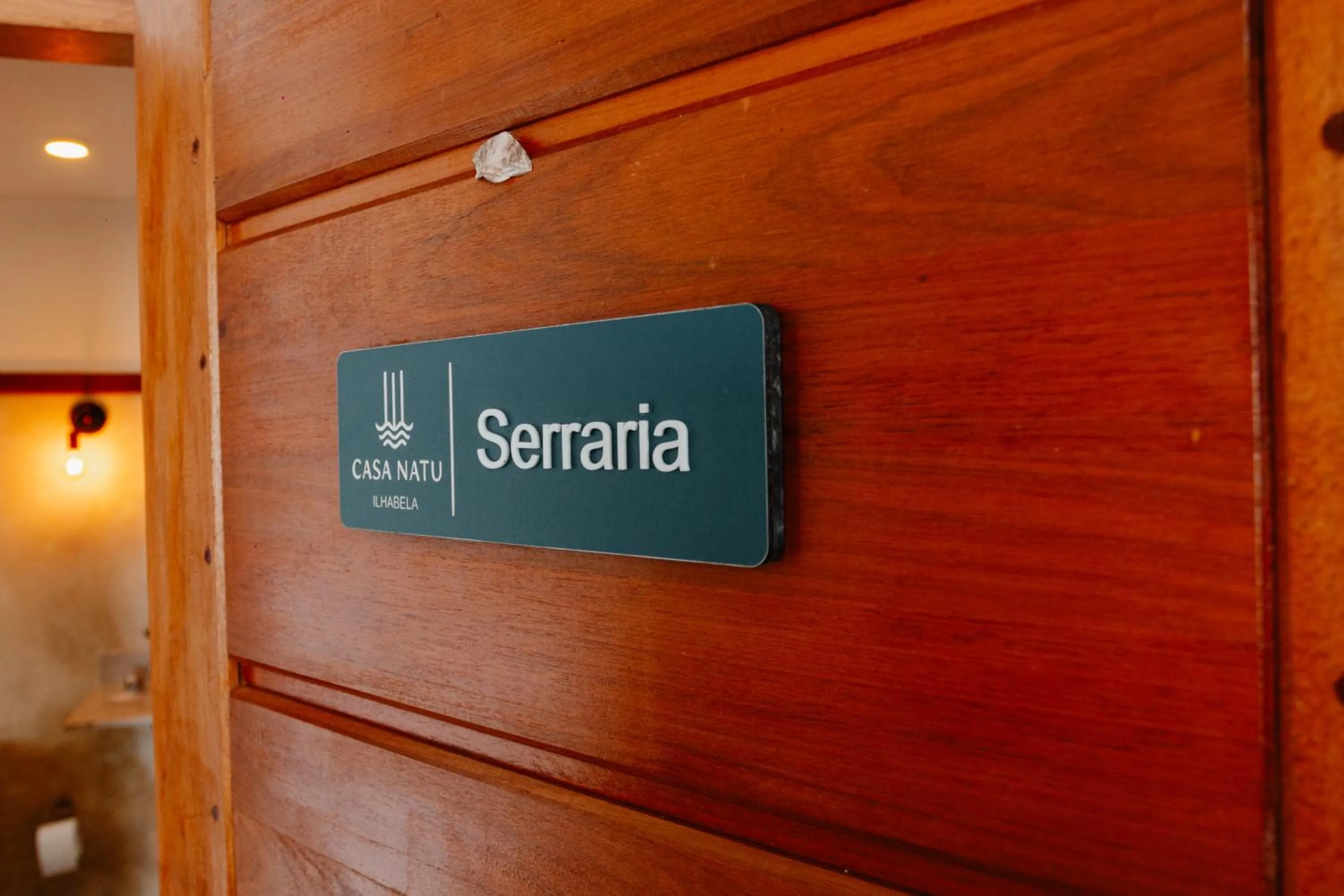 Logo/Certificate/Sign in Casa Natu Ilhabela Mirante