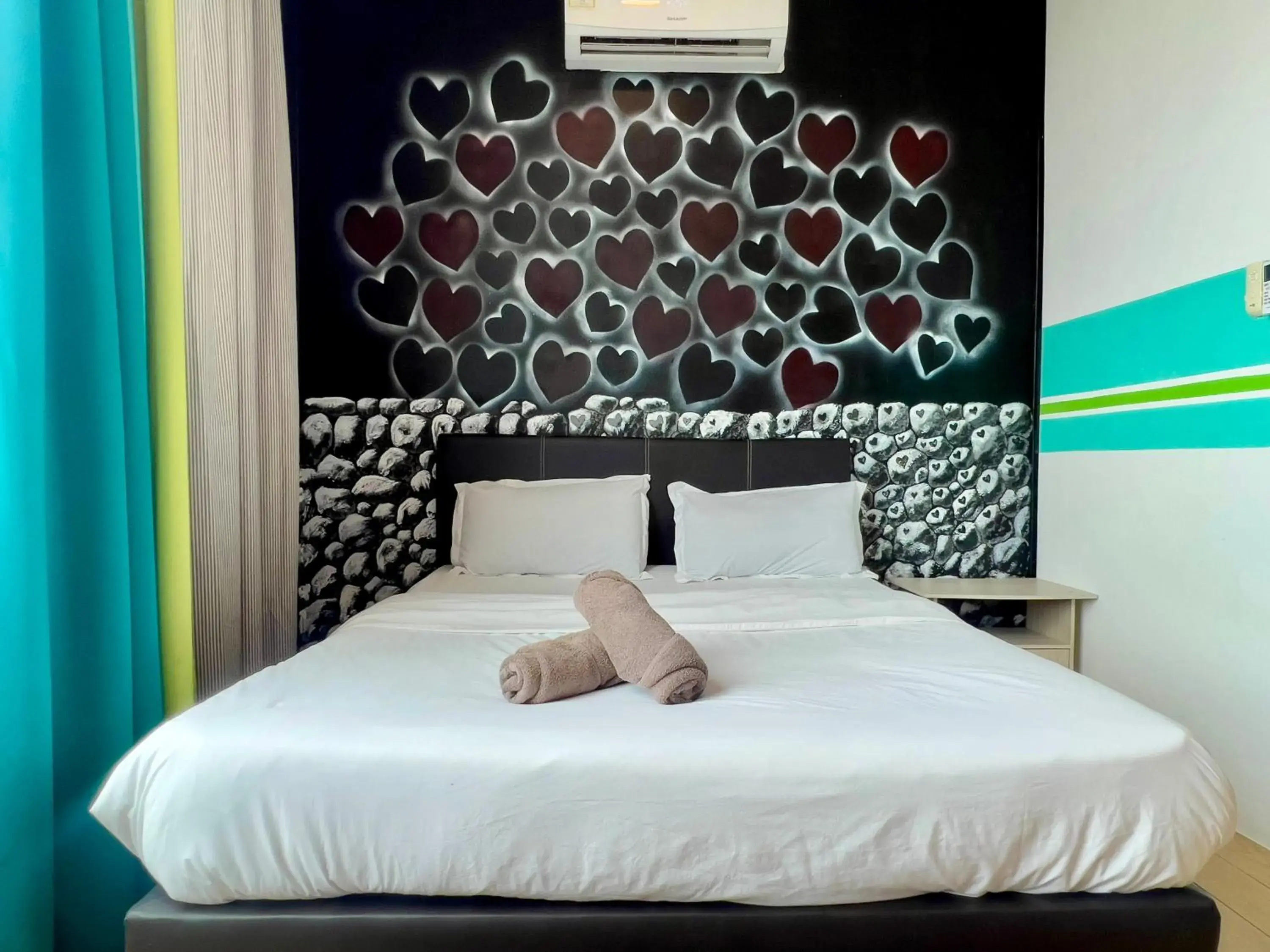 Bed in Hush Inn at ITCC Manhattan Suites Bed in Hush Inn at ITCC Manhattan Suites