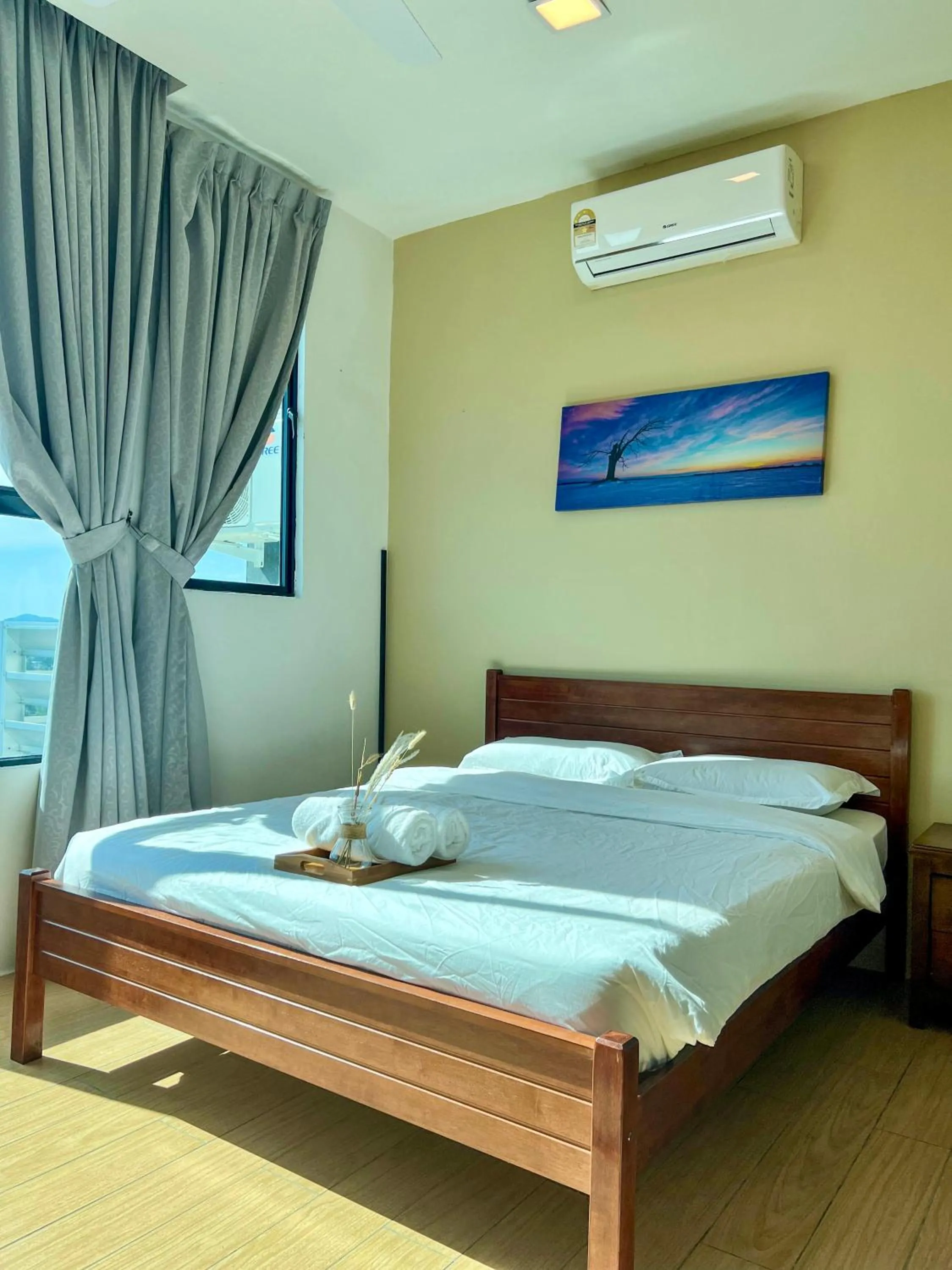 Bed in Hush Inn at ITCC Manhattan Suites