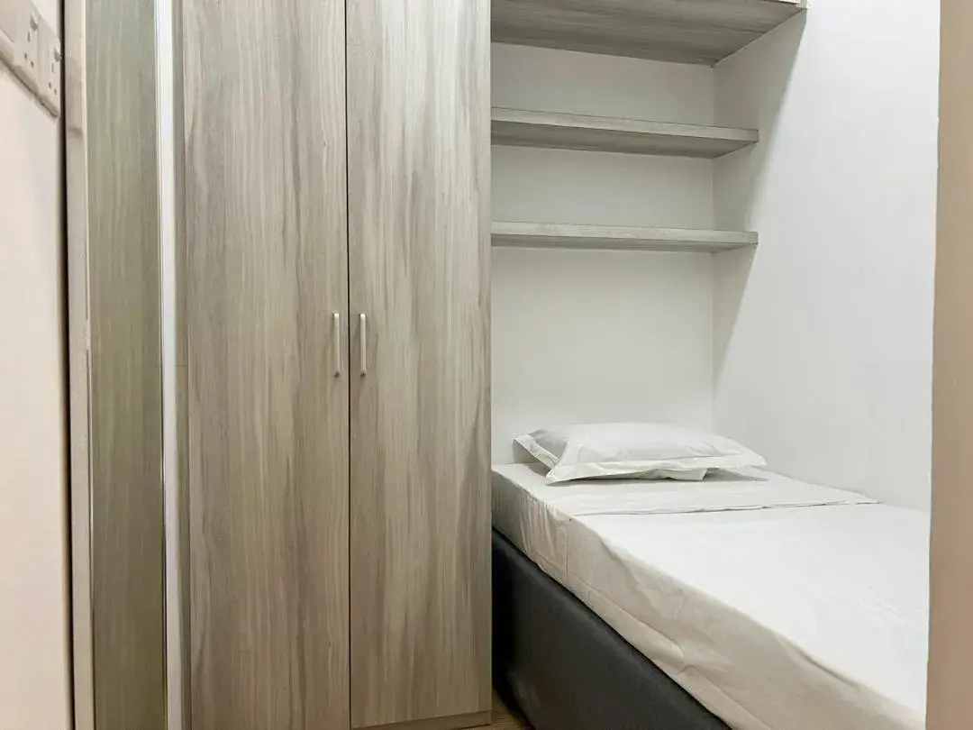 Bed in Hush Inn at ITCC Manhattan Suites Bed in Hush Inn at ITCC Manhattan Suites