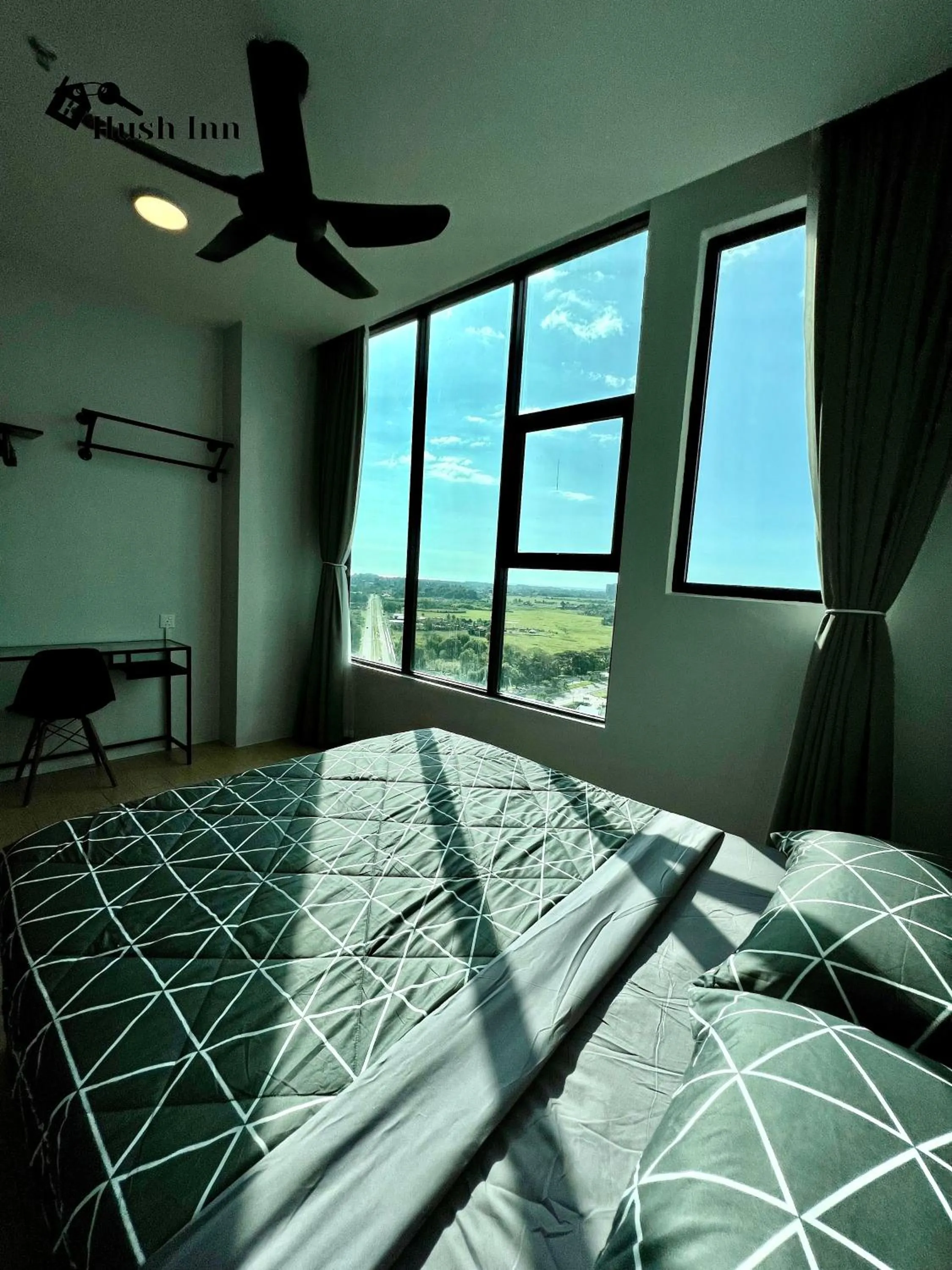 Bed in Hush Inn at ITCC Manhattan Suites