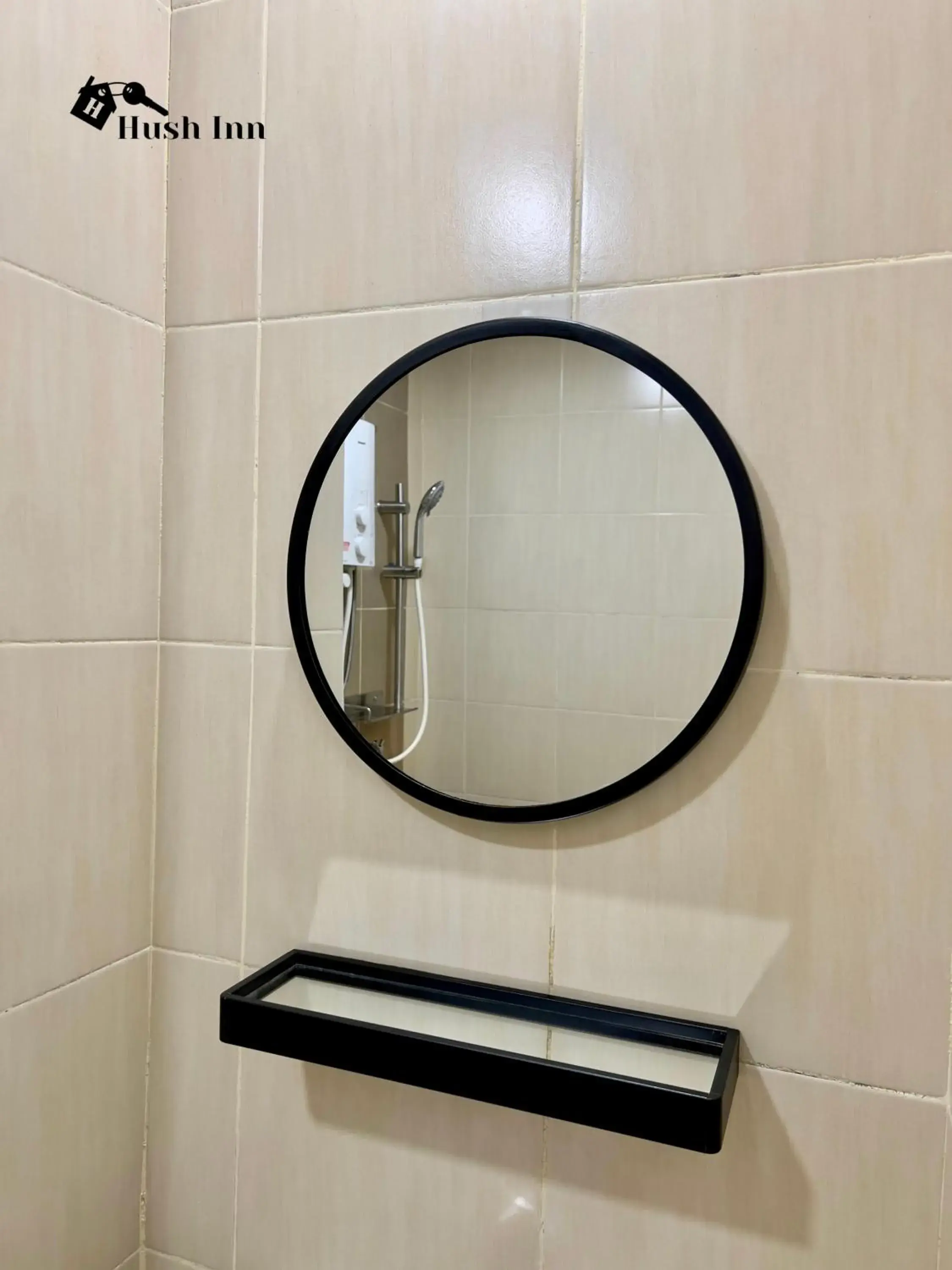 Bathroom in Hush Inn at ITCC Manhattan Suites Bathroom in Hush Inn at ITCC Manhattan Suites