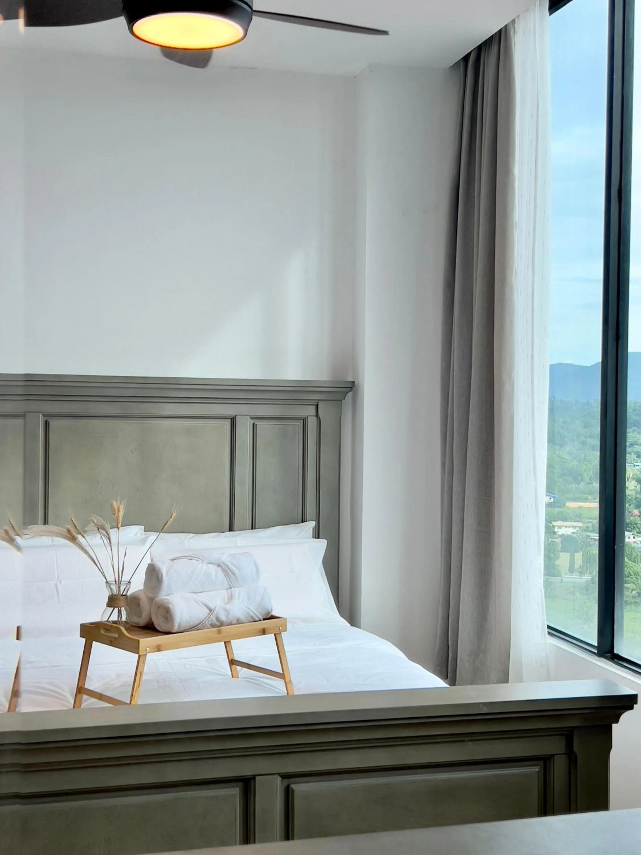 Bed in Hush Inn at ITCC Manhattan Suites