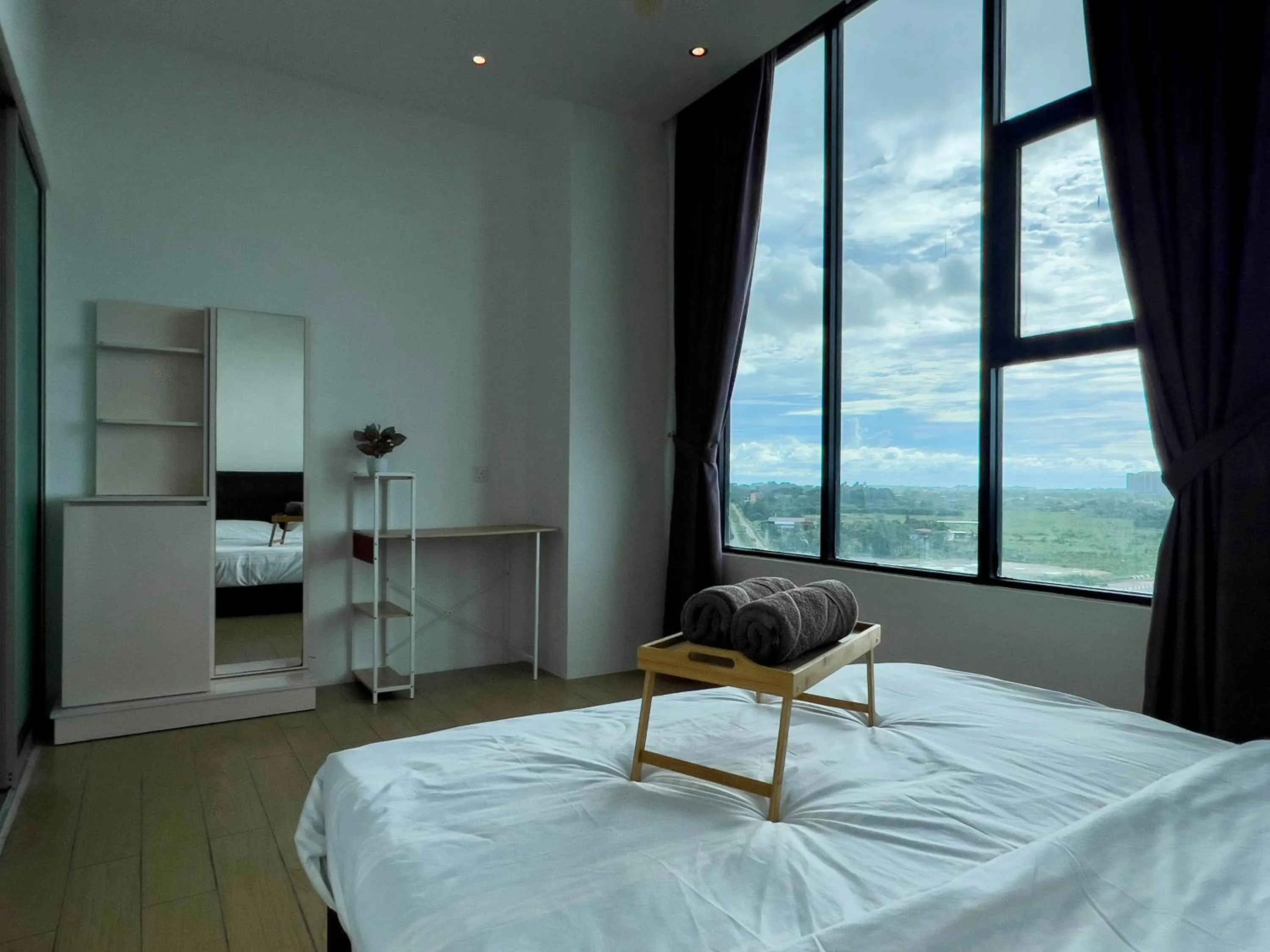 Bed in Hush Inn at ITCC Manhattan Suites