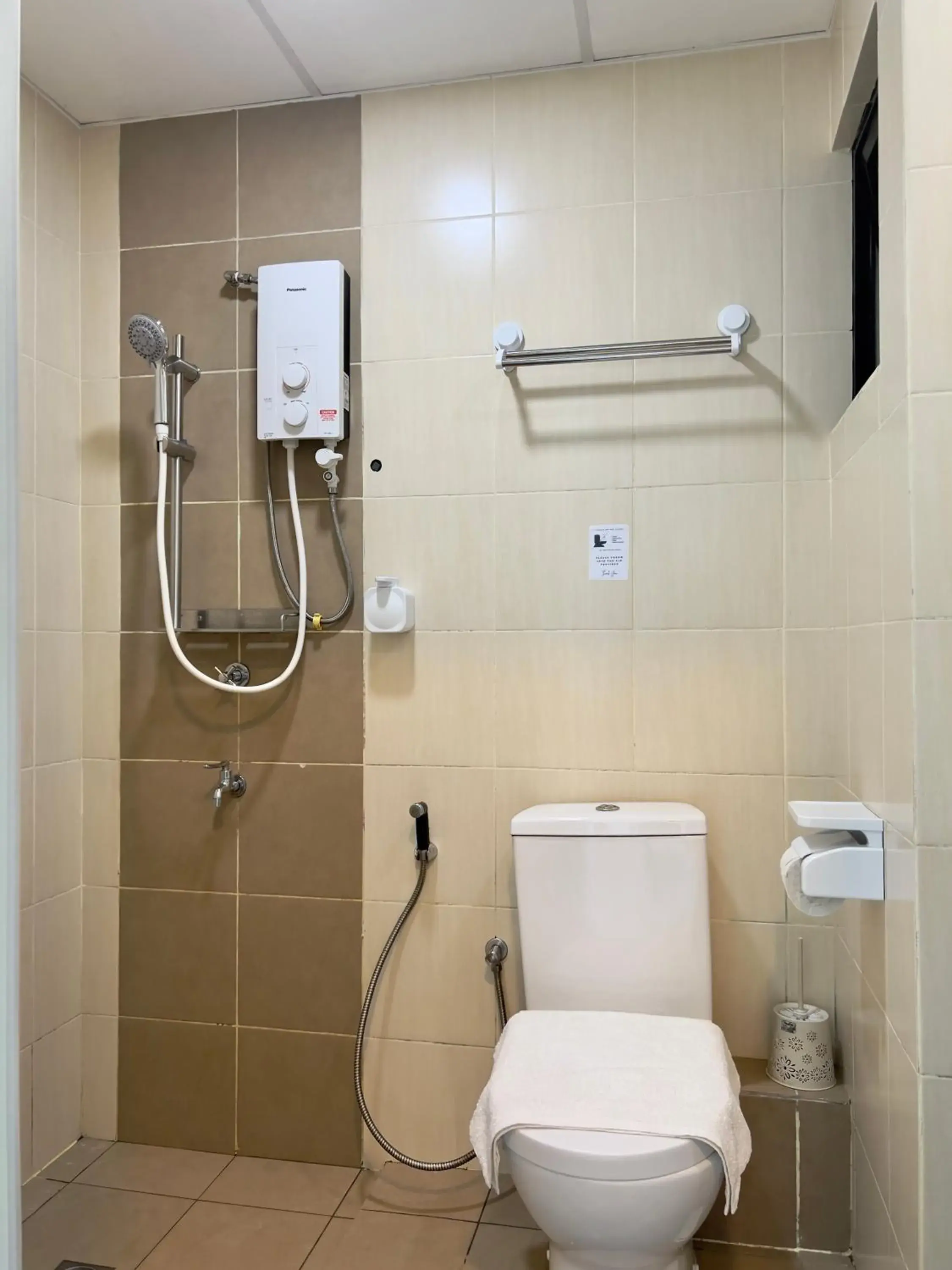 Bathroom in Hush Inn at ITCC Manhattan Suites Bathroom in Hush Inn at ITCC Manhattan Suites