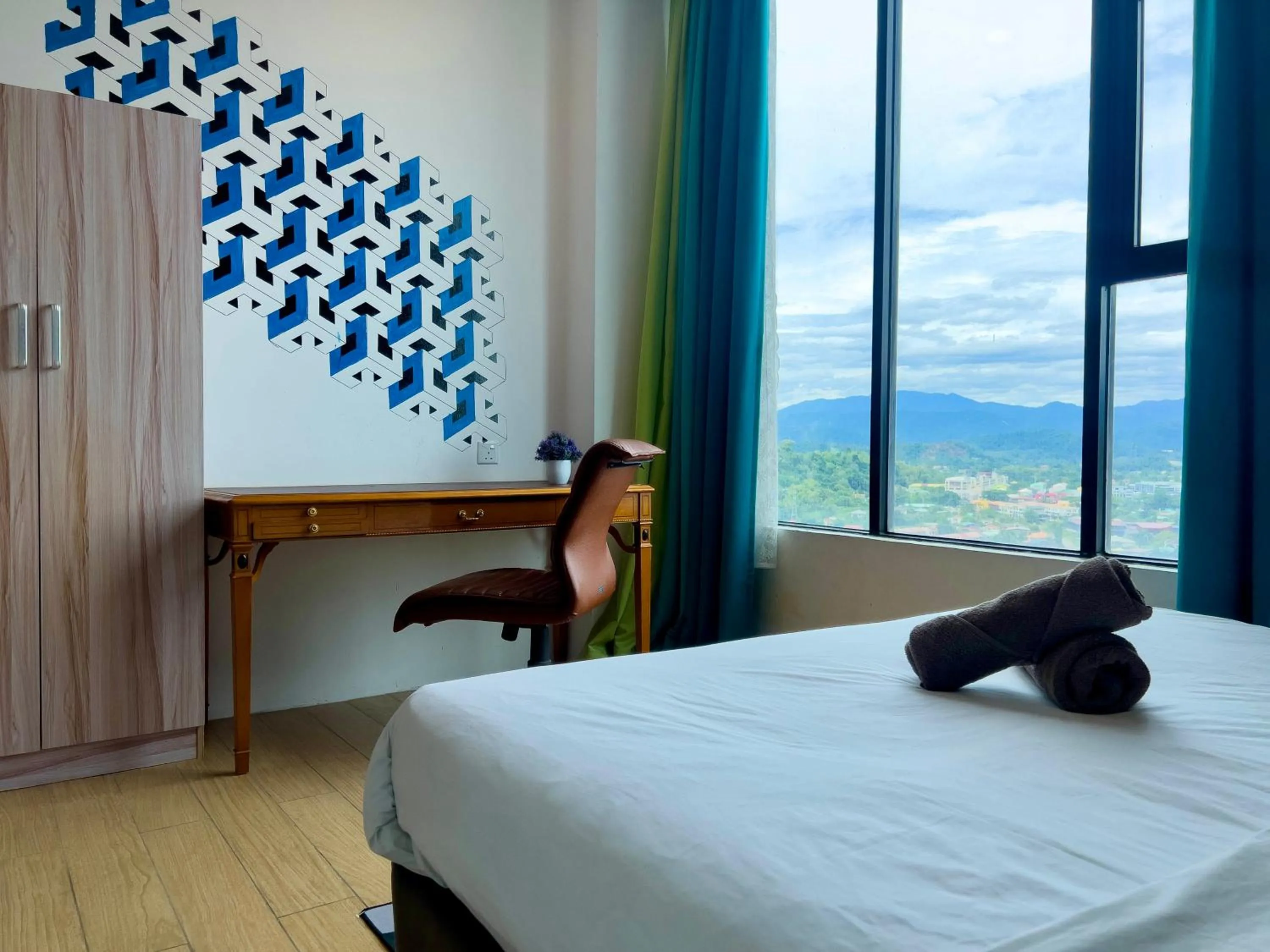 Bed in Hush Inn at ITCC Manhattan Suites