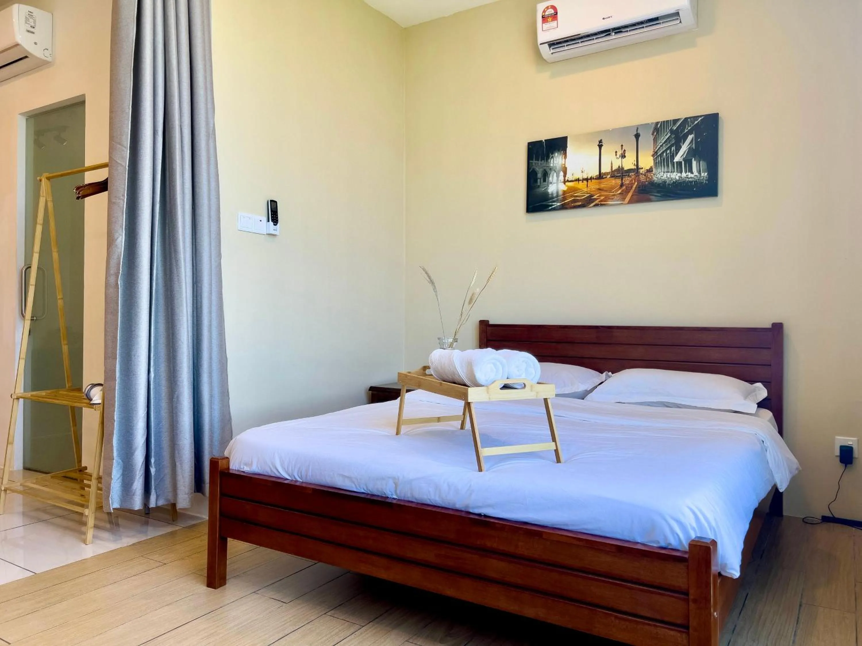 Bed in Hush Inn at ITCC Manhattan Suites