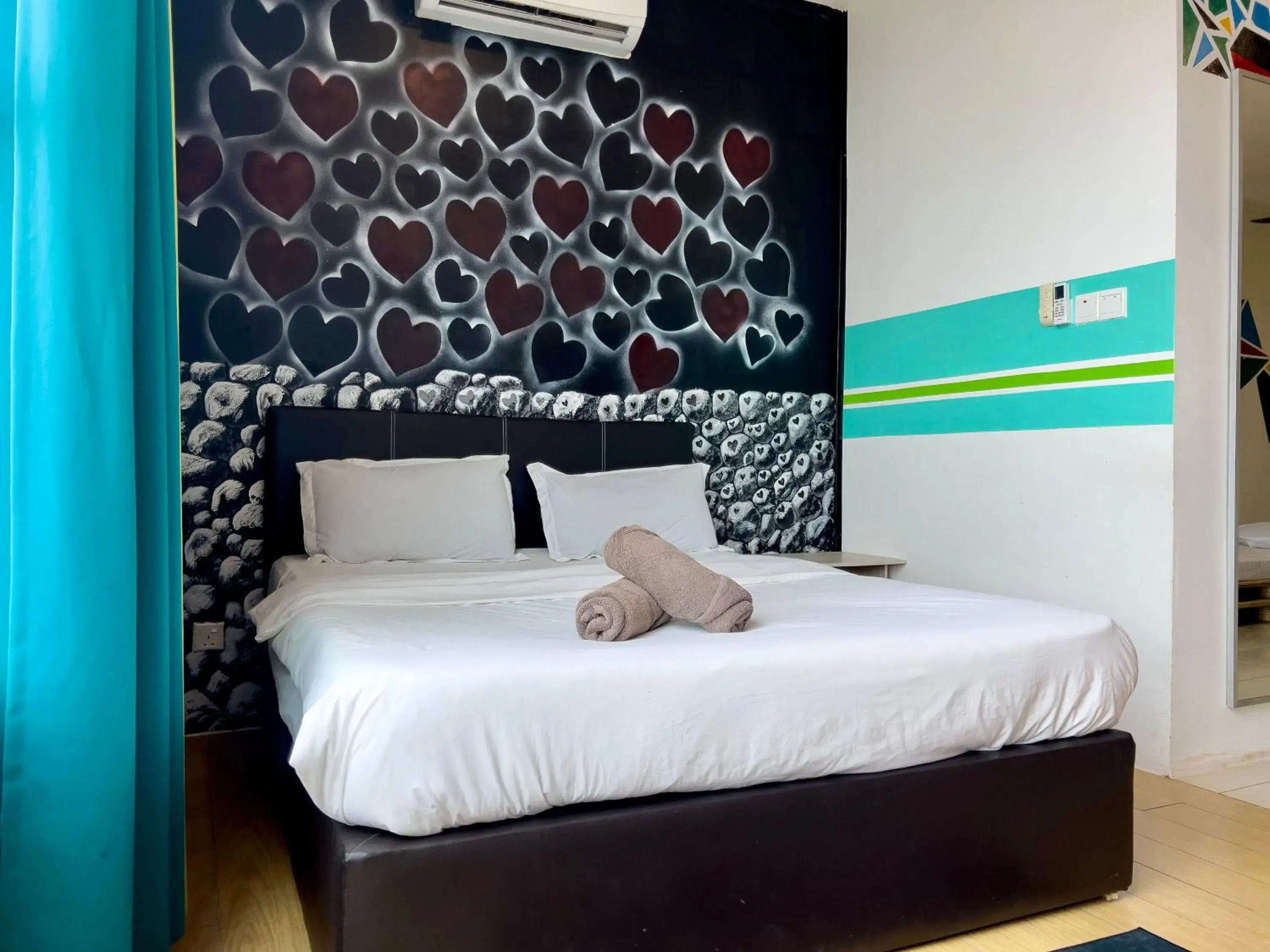 Bed in Hush Inn at ITCC Manhattan Suites Bed in Hush Inn at ITCC Manhattan Suites