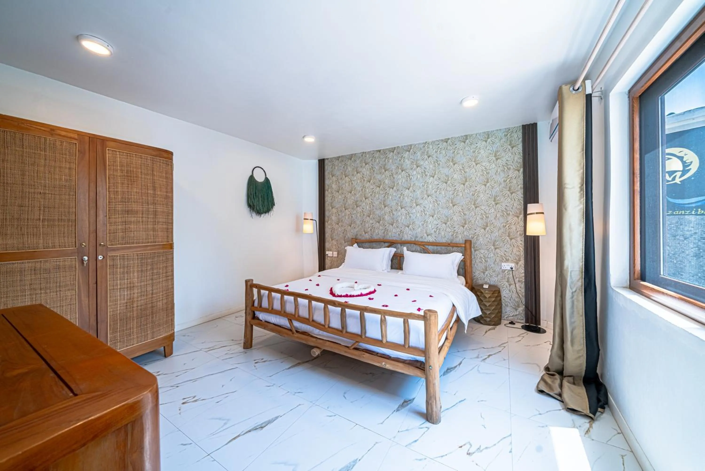 Bed in Coral Rocks Hotel & Restaurant