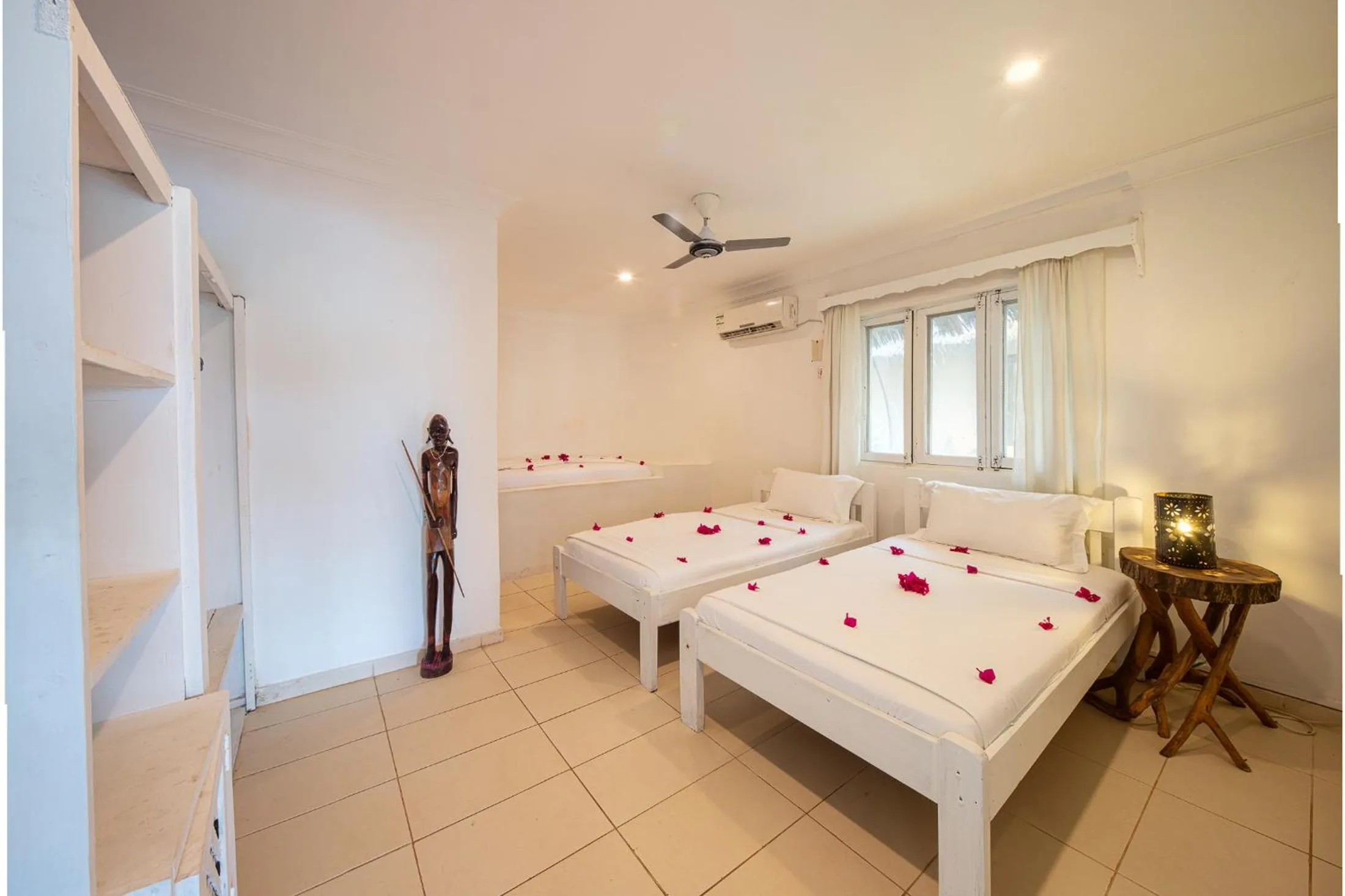 Photo of the whole room, Bed in Coral Rocks Hotel & Restaurant