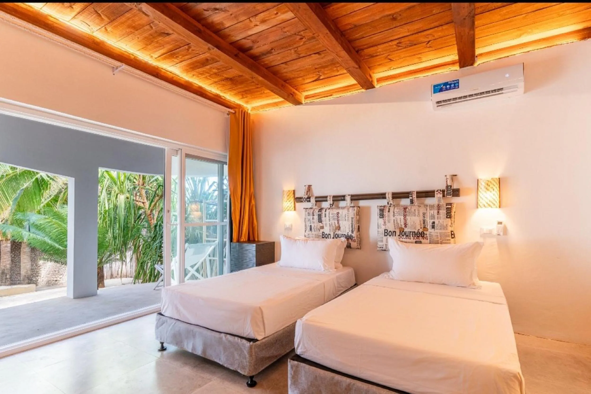 Photo of the whole room, Bed in Coral Rocks Hotel & Restaurant