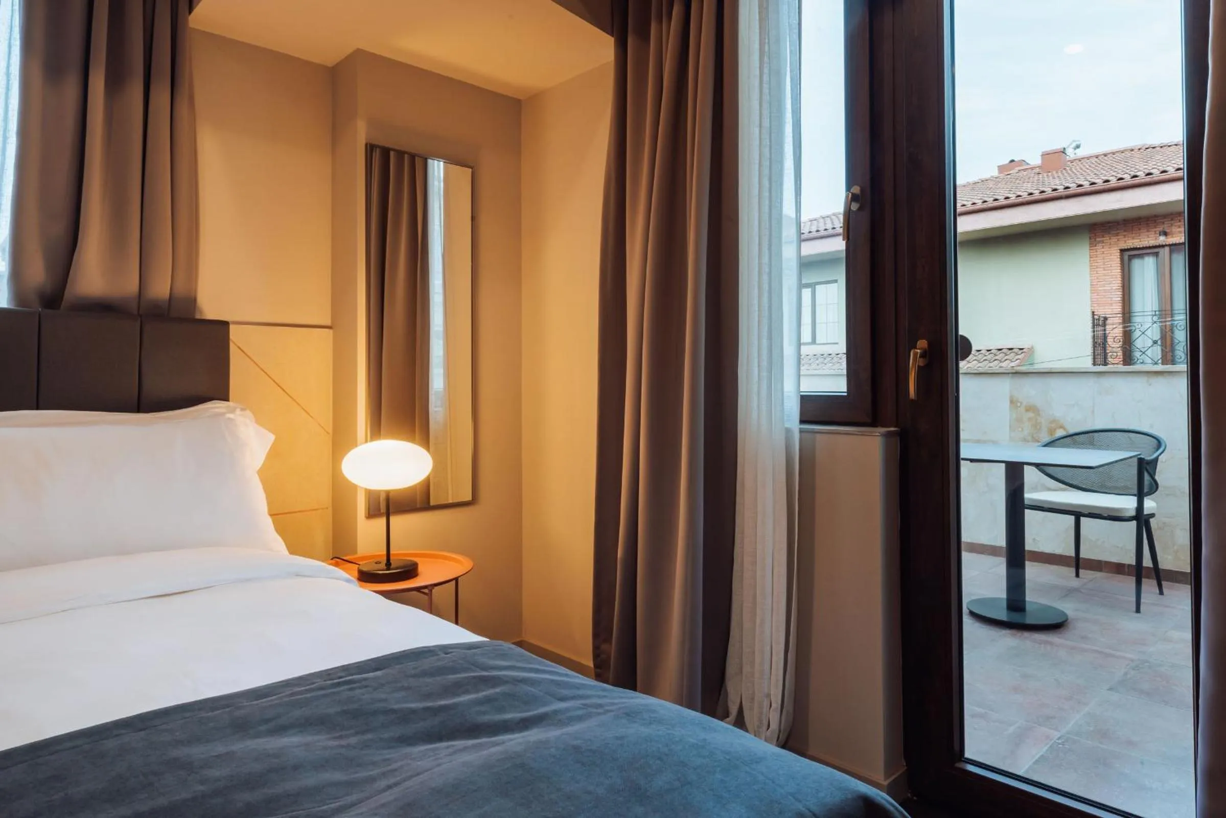 Bed in Reikartz King Tamar Tbilisi