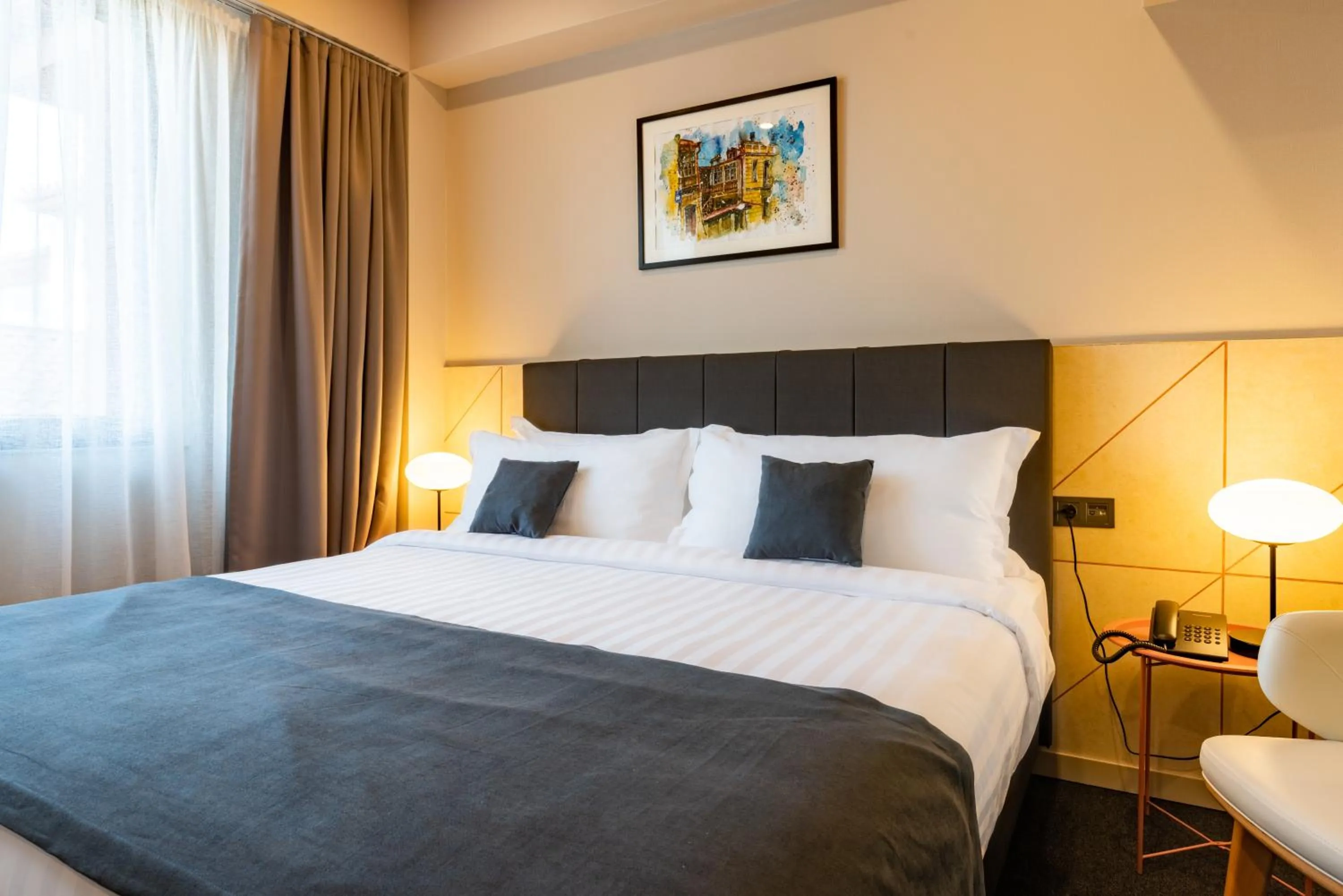 Bed in Reikartz King Tamar Tbilisi