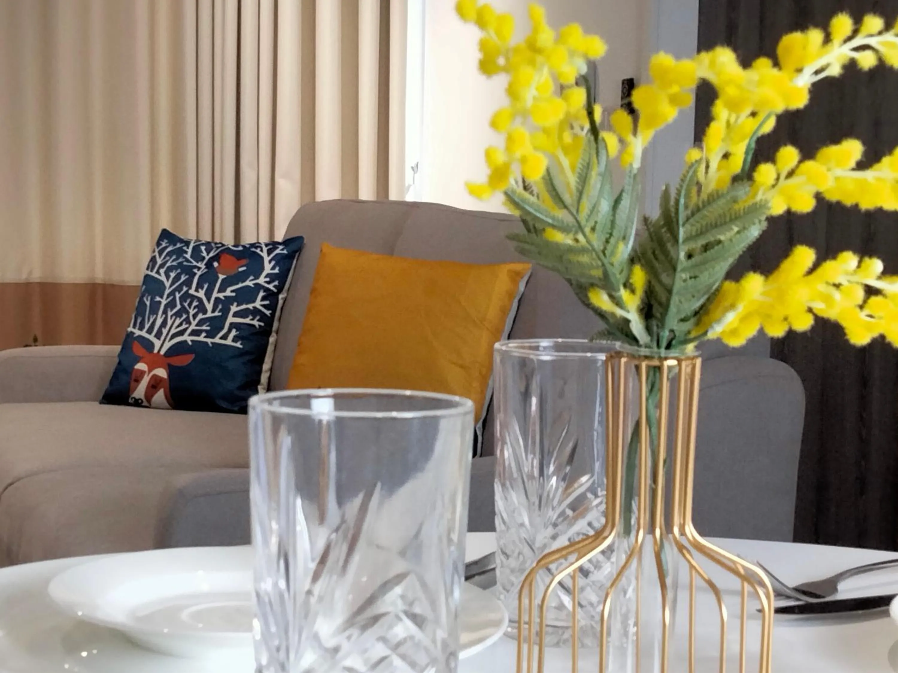 Living room in Continew Residence by HomeBrickz