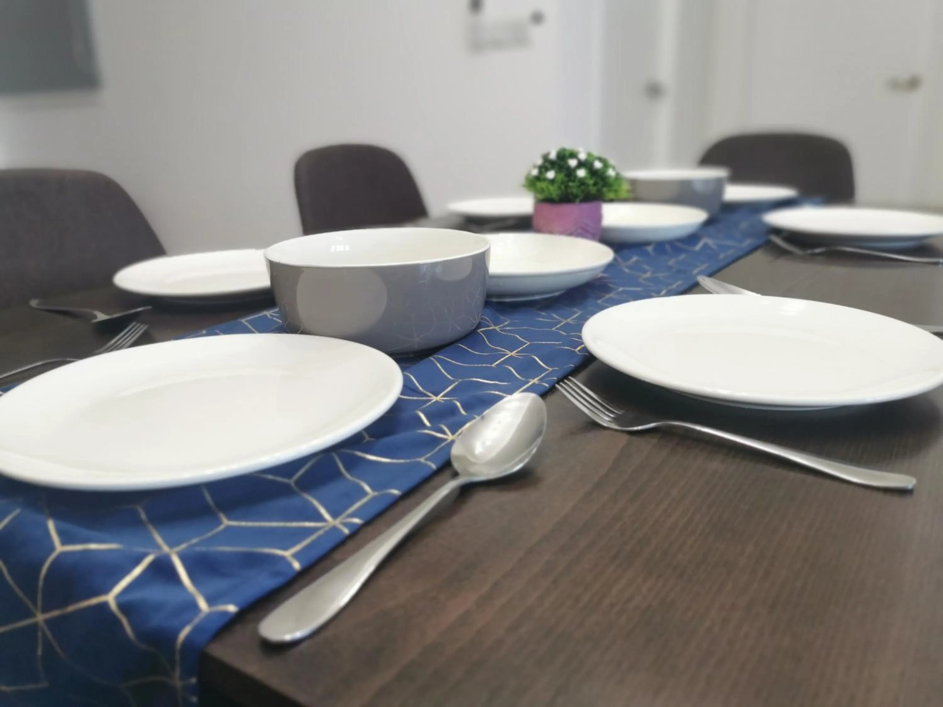 Dining area in Continew Residence by HomeBrickz