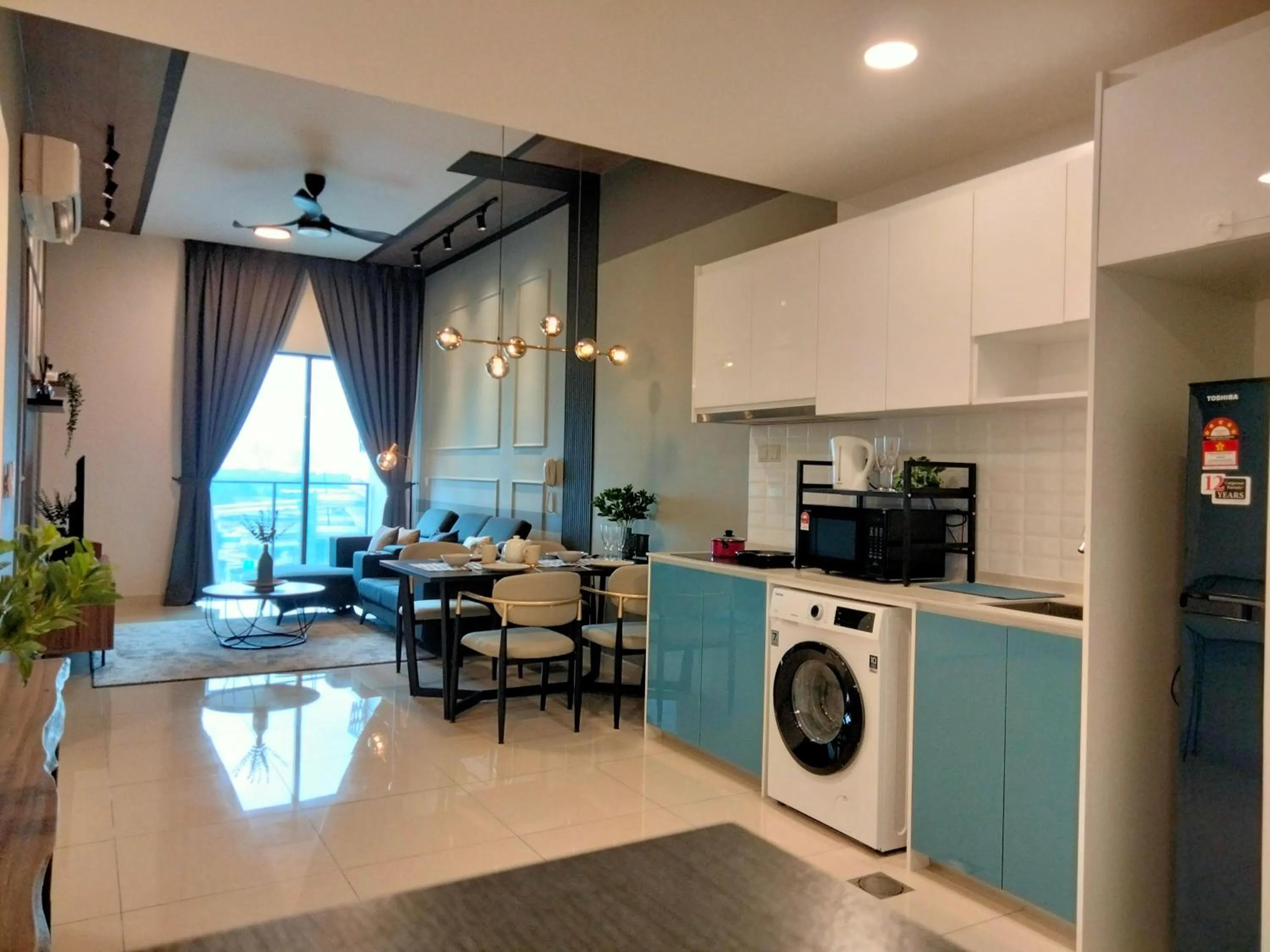 Kitchen or kitchenette in Continew Residence by HomeBrickz