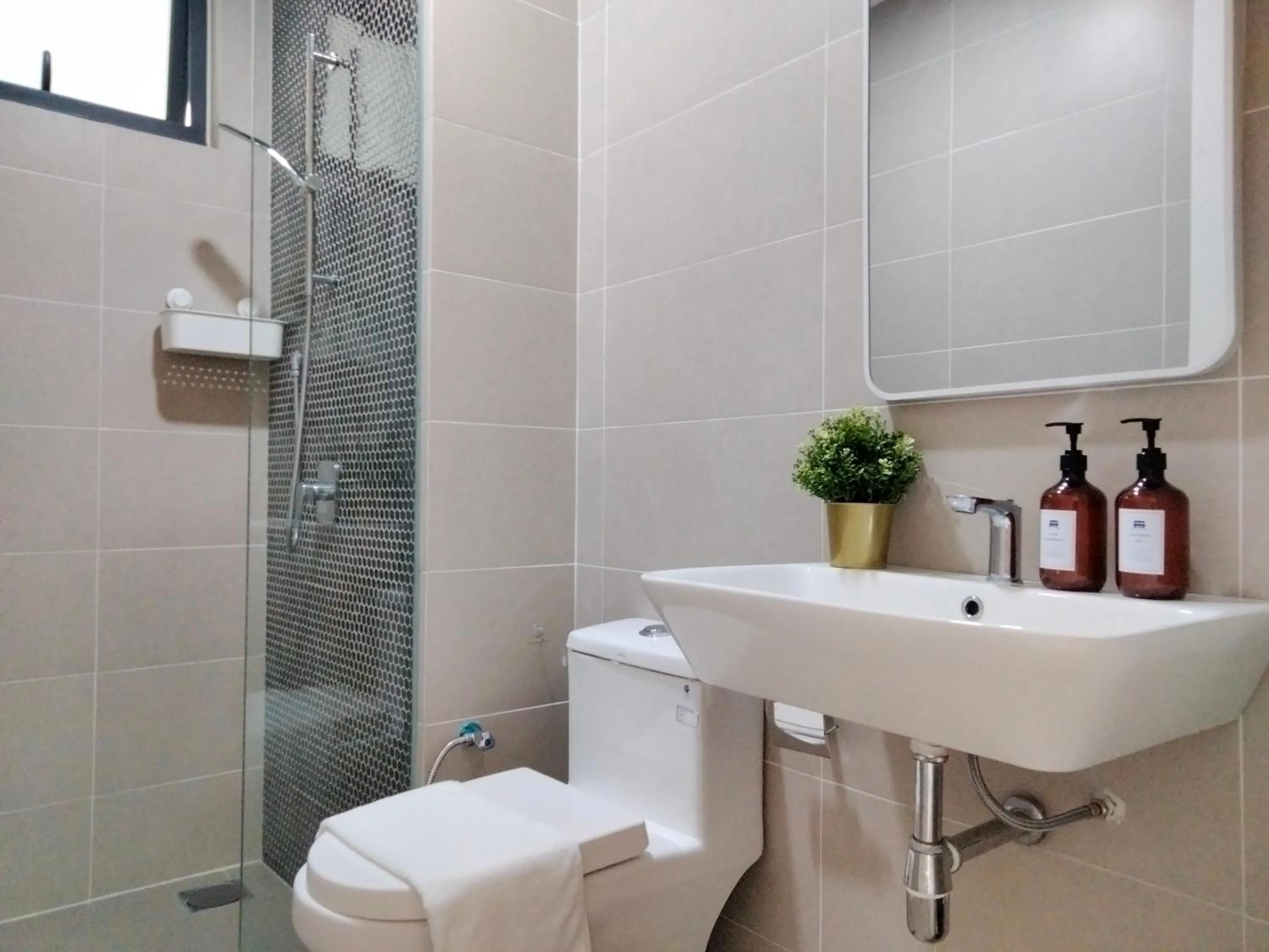 Shower in Continew Residence by HomeBrickz