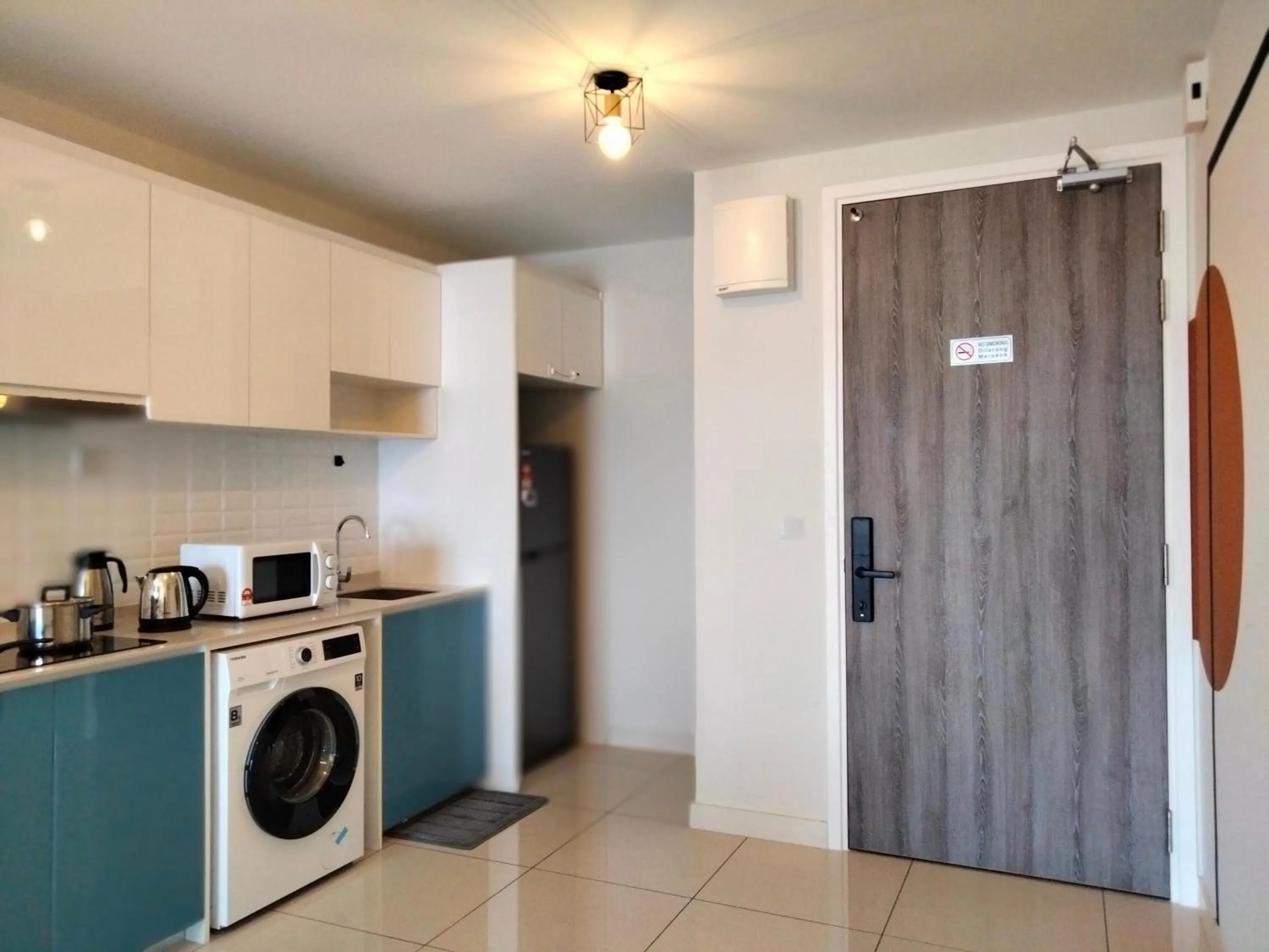 Kitchen or kitchenette in Continew Residence by HomeBrickz