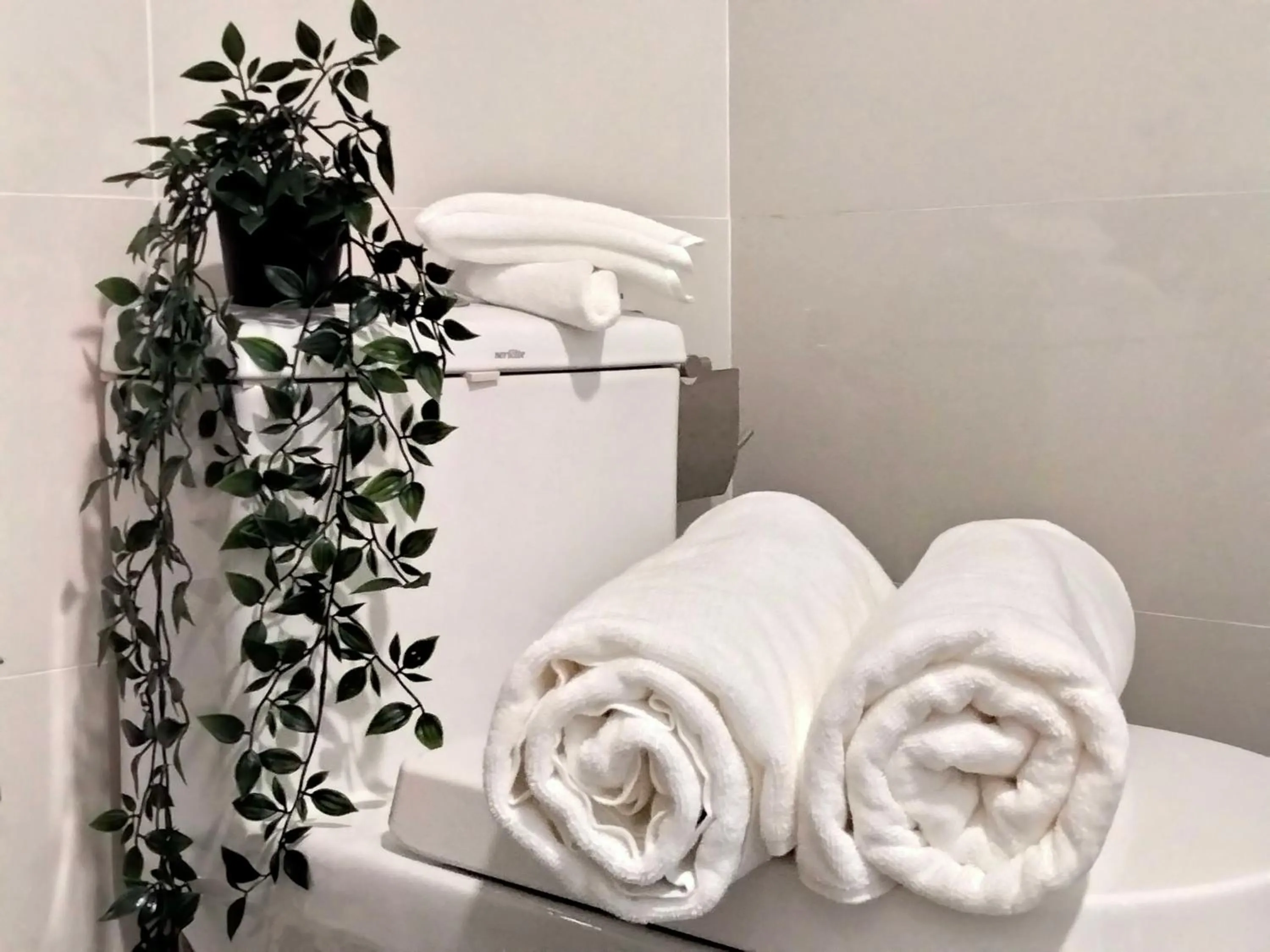 Toilet in Continew Residence by HomeBrickz