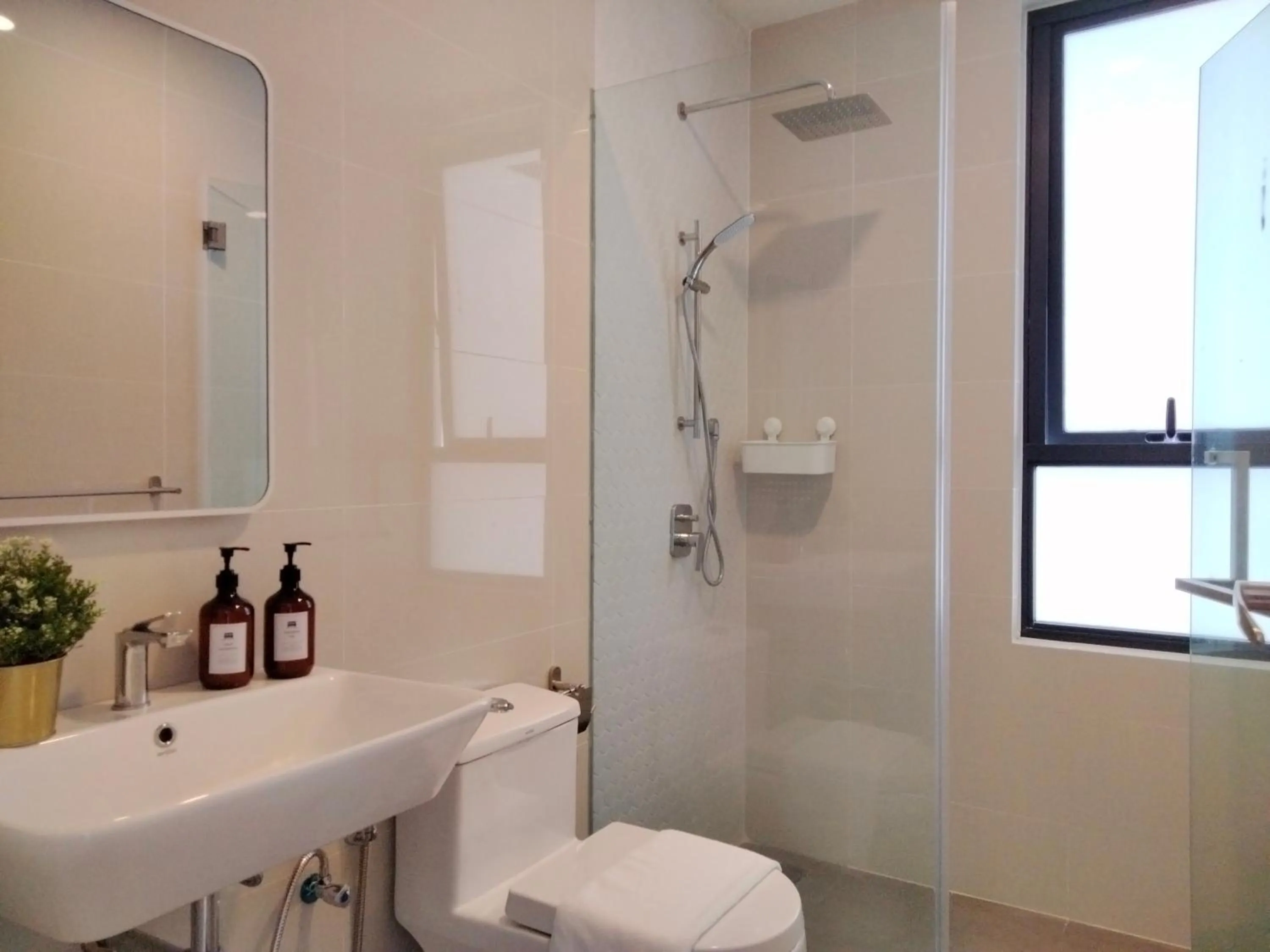 Shower in Continew Residence by HomeBrickz