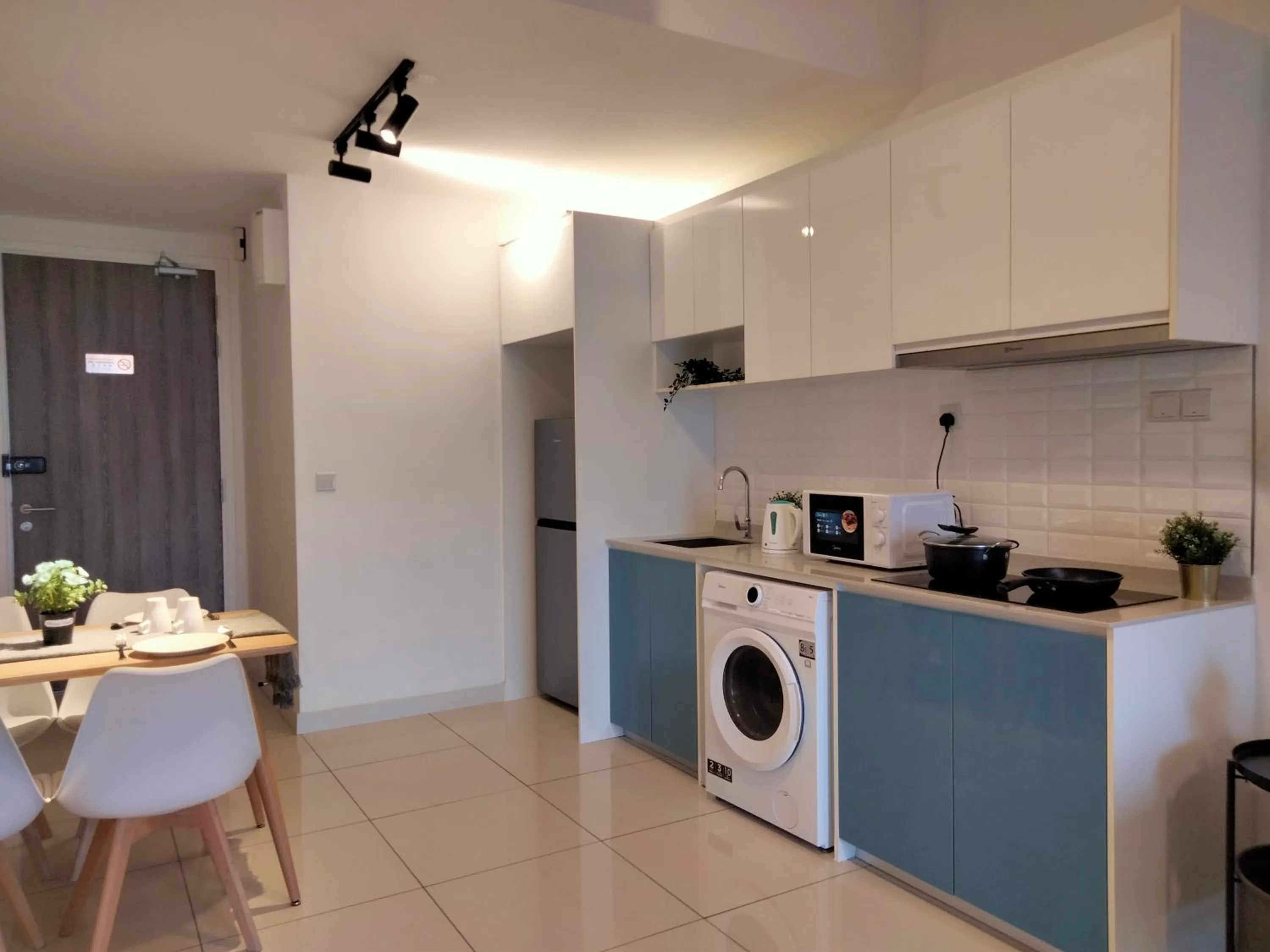 Kitchen or kitchenette in Continew Residence by HomeBrickz